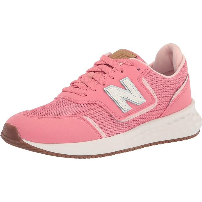 The New Balance Women's Fresh Foam X70 V1 Sneaker is a lightweight and versatile athletic shoe designed for comfort and style. It features a Fresh Foam midsole that provides cushioning and support dur