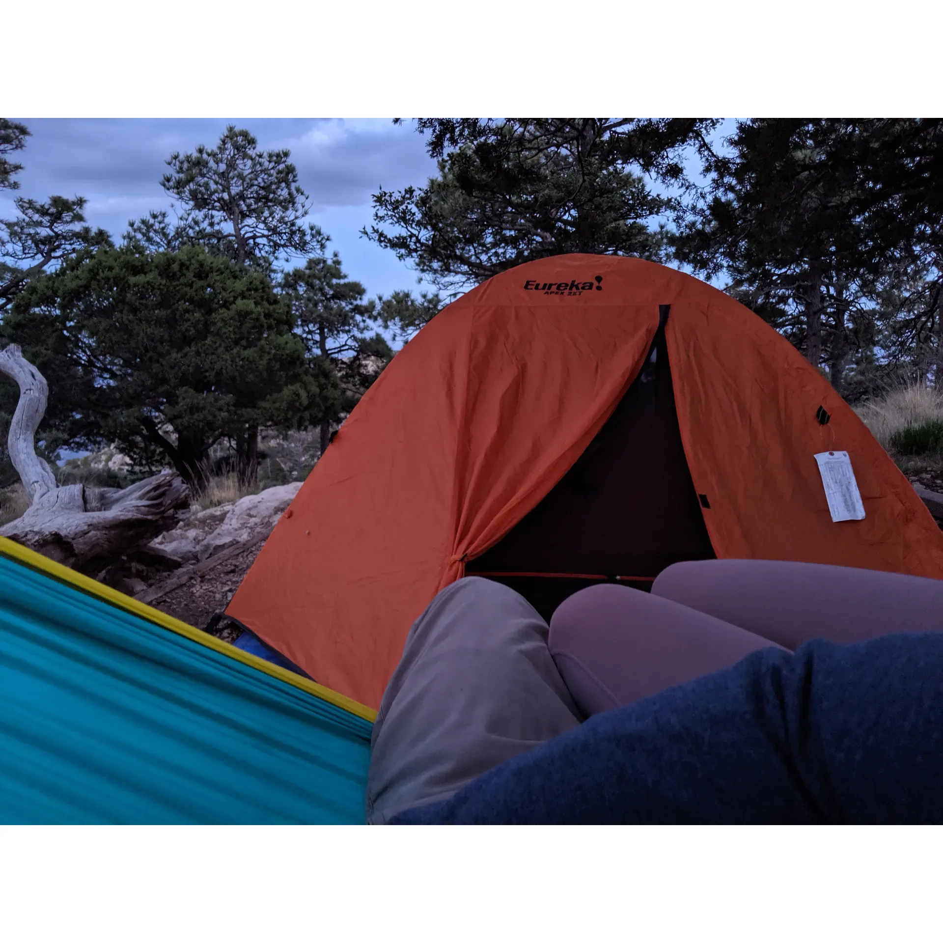 Effortlessly rewarding for adventurous souls, Guadolepe Peak Wilderness Campground offers a premier high-altitude camping experience complemented by breathtaking panoramic vistas. This backcountry haven is the ideal basecamp for those seeking to conquer Guadalupe Peak, the highest point in Texas, or simply to immerse in the serene beauty of the wilderness.

Perched on the mountainside, this campground presents visitors with an invigorating 3-mile ascent accompanied by a 2000-foot elevation gain, sure to challenge and exhilarate the most avid hikers. As you rise above the desert floor, the landscape unfolds to reveal a dramatic contrast between the rugged mountains on one side and the expansive desert stretching to the east, providing an unrivaled backdrop that captivates every onlooker.

Upon arrival, the peaceful shade of pines awaits to embrace tired hikers, offering a tranquil retreat where legs can rest and spirits can soar. With its proximity to the summit, less than a mile away and only 1000 feet below, early risers are awarded the unique privilege of embarking on a sunrise journey to touch the sky at Texas's apex.

While the wind can present an exhilarating challenge, it also adds to the dynamic wilderness character of the encampment. Campsites are thoughtfully appointed, ensuring that every guest can savor comfortable tent pads along with magnificent views that make for a truly memorable stay.

A testament to the commitment to maintenance and visitor comfort, facilities such as an outhouse stocked with essentials, as well as running water restrooms, potable water spouts, and a dishwashing sink are conveniently available a brief walk away. The proximity to a network of trails invites exploration of the majestic surroundings, beckoning hikers to step out and discover all that this natural playground has to offer.

Though the campground is a sought-after destination among outdoor enthusiasts, resulting in bustling activity, its appeal only resonates more profoundly with each visitor's encounter. Guadalupe Peak Wilderness Campground's combination of challenging trails, outstanding natural beauty, and comfortable amenities makes for an exceptional camping experience that beckons a return to its lofty heights. Description by ChatGPT.