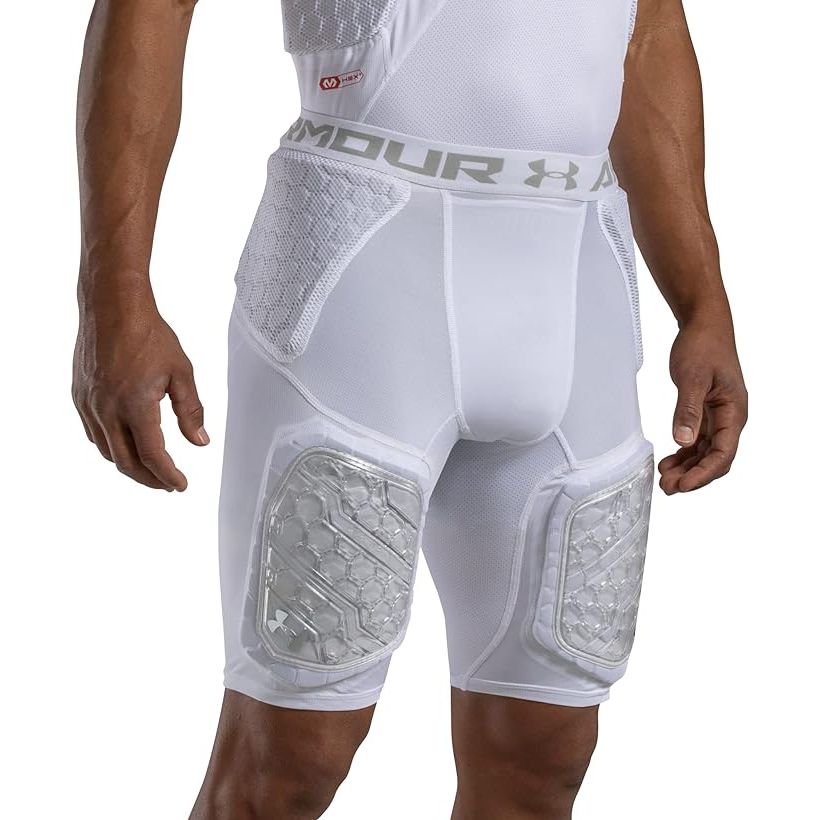 The Under Armour UA Gameday Armour Pro 5Pad Girdle is a high-performance compression garment designed for adult athletes. This girdle features 5 strategically placed pads to provide targeted protection to key areas such as the thighs, hips, and tailbone.