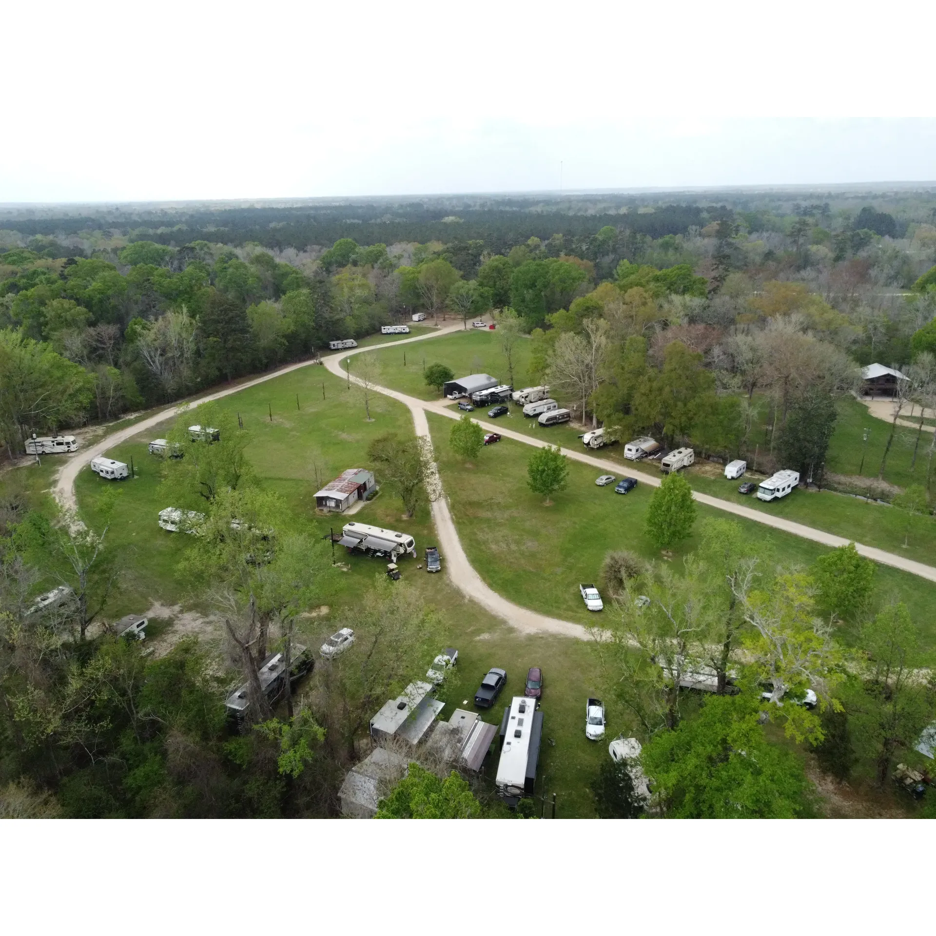 Riverbend Campground emerges as a picturesque outdoor retreat that beckons families, wedding parties, and RV enthusiasts alike. With its verdant landscapes and serene riverfront, the campground offers a harmonious blend of relaxation and recreation. The owner, renowned for his incredible hospitality, plays the dual role of gracious host and passionate guide, ensuring every guest's interests are catered to with a personal touch.

Guests are treated to a charming escape where they can meander down to the river to unfurl in tranquility or engage in joyful moments on the accessible great sandbar. The sprawling grounds provide a pristine setting for children to play freely in a family-friendly atmosphere. Diligently maintained facilities, including 24/7 showers and restrooms, enhance the comfort of the stay while the convenience of an on-site washer and dryer – with a trust-based payment system – adds a thoughtful touch to the amenities provided.

Riverbend Campground also stands out as an enchanting wedding venue, transforming into a fairy-tale setting illuminated with beauty. Guests who have celebrated their special day here reflect in delight on the picturesque scenery and commend the supportive, friendly owners for their help in making their occasions unforgettable.

Furthermore, the strong sense of community is palpable when RV clubs convene, turning the space into a hub of camaraderie and shared experiences. With the host's exceptional dedication to guest satisfaction, every visit promises to be filled with warm welcomes and exceptional service.

In proximity to Louisiana River Adventures, the campground serves as an ideal base for those wishing to explore the natural splendor of the region. As a haven exuding tranquility and charm, Riverbend Campground awaits return visits with promises of continued excellence and the forging of new, cherished memories. Description by ChatGPT.