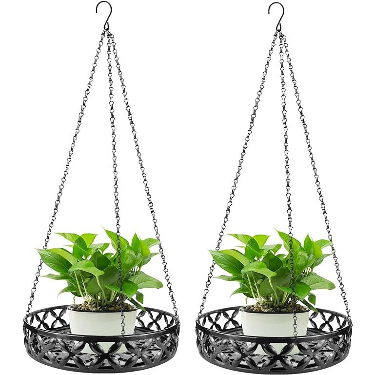 The Plant Hanger is a set of 2 metal hanging plant shelves designed for decorative plant display. Each shelf is designed to hold flower pots and planters, creating a modern and stylish hanging display for indoor or outdoor spaces.