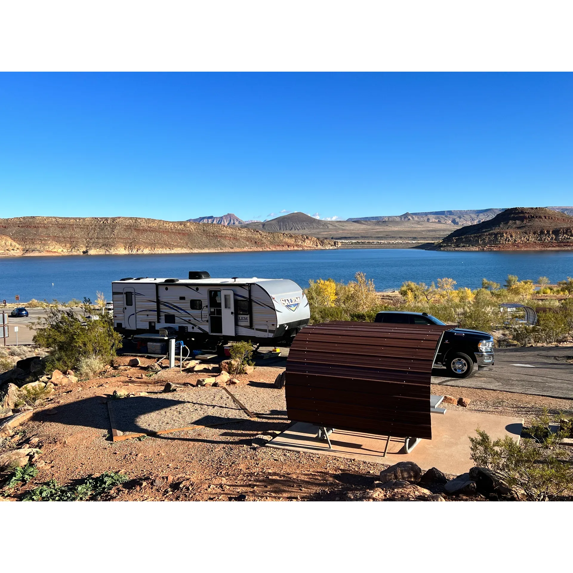 Quail Creek Campground emerges as an idyllic outdoor retreat boasting meticulously maintained grounds and extraordinary panoramic views that captivate all who visit. The campground transforms into a hive of activity during the summer months with an array of recreational opportunities for fun-seeking campers, while offering a serene lakeside getaway throughout the rest of the year.

Praised for its prime location, the campground entices visitors with well-arranged amenities including shaded picnic areas with concrete slabs, fire pits for cozy gatherings, as well as water and electric hookups catering to the needs of both tent campers and RV enthusiasts. With an emphasis on comfort, Quail Creek Campground provides clean restrooms equipped with air conditioning and hot and cold showers, ensuring guests a refreshed and comfortable experience.

Guests in search of tranquility appreciate the quiet atmosphere that this campground orchestrates, where the gentle lapping of the lake's waters enhances the experience of stargazing under the clear night skies. The friendly and welcoming staff contribute to the overall positive ambiance, gladly offering recommendations for outdoor adventures like hikes to discover local geological and archaeological wonders.

Adding to its charm, the campground's proximity to nature allows guests to engage in paddle sports with convenient equipment rentals available at reasonable rates, guaranteeing an unforgettable adventure on the water.

Quail Creek Campground is in the midst of exciting advancements with plans for new facilities that promise to enrich the camping experience. Visitors can look forward to the introduction of additional campsites, an anticipated dump station, and upgraded bathroom facilities slated for completion, all designed to enhance the natural beauty and guest amenities that make this southern Utah destination a place where cherished memories are forged and visitors eagerly plan their return. Description by ChatGPT.