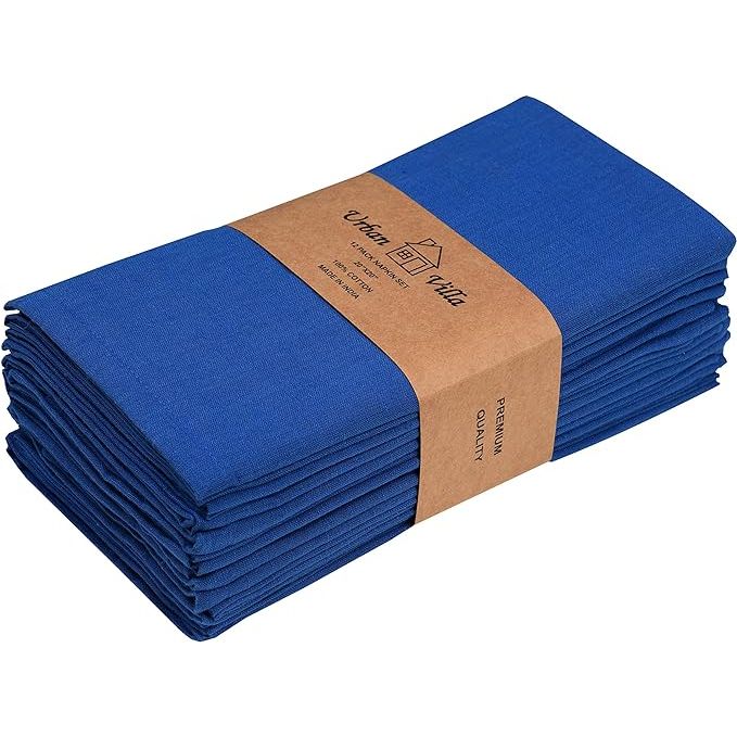 The Urban Villa Dinner Napkins in Royal Blue color are a set of 12 premium quality cloth napkins made from 100% cotton. These napkins measure 20x20 inches and feature mitered corners for a polished look on your dining table. The slub texture adds a touch of elegance and luxury to your dining experience.