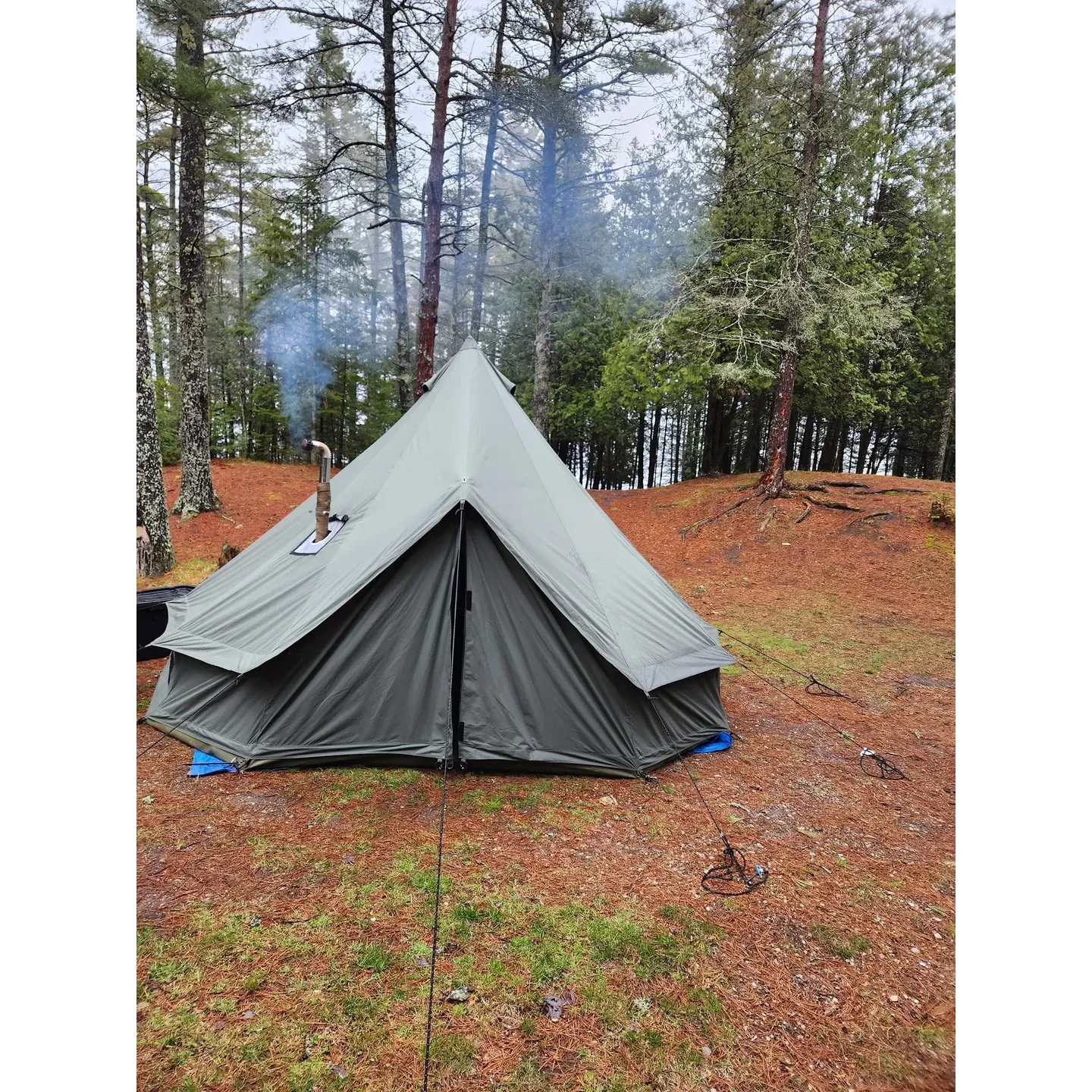 Portage Bay State Campground offers a tranquil outdoor experience for campers seeking the beauty of the wilderness without the distractions of the modern world. Boasting minimalistic charm, this rustic retreat provides essential amenities such as pit toilets and a reliable hand pump for fresh water, ensuring a comfortable stay amidst nature.

Campers are treated to a selection of well-maintained sites, ranging from good to exquisite, each offering a unique perspective of the campground's picturesque surroundings. Whether you're setting up your tent on a bluff overlooking the glistening waters of Lake Michigan or nestled within the serenity of the forest, the campsites promise unforgettable views and a sense of escape.

The campground's prime location grants direct access to a magnificent beach. Visitors can stroll from their site onto the sandy shores for days filled with sunbathing, swimming, and the soothing sounds of the waves. The seclusion of the beach means it's often possible to enjoy the splendid scenery in peace, accompanied only by nature's soundtrack.

Adventure-seekers will delight in the hiking path that meanders through the lush forest, connecting the campground to Bog Lake and Lake Michigan's stunning shore. This mile-long trail is ideal for an invigorating hike or a leisurely walk, especially enchanting during autumn when the foliage creates a striking tapestry of color.

Despite its remote setting, a journey of half an hour on gravel roads transports you to a hidden gem, far from the hustle and bustle of the city. The peaceful ambiance is upheld by the natural sounds of the surrounding environment, providing a pure and undisturbed outdoor retreat.

Portage Bay State Campground stands out as a highlight for many seasoned travelers who cherish the simple pleasure of witnessing the grandeur of a Great Lake shoreline. With such natural beauty and an assortment of prized campsites available even during peak seasons, it attracts campers who appreciate solitude and the wonder of the great outdoors.

For those yearning to disconnect from their digital distractions and reconnect with nature, Portage Bay State Campground is an idyllic destination where serene landscapes, inviting waters, and splendid hiking await, all complemented by the campground's unassuming yet captivating allure. Description by ChatGPT.