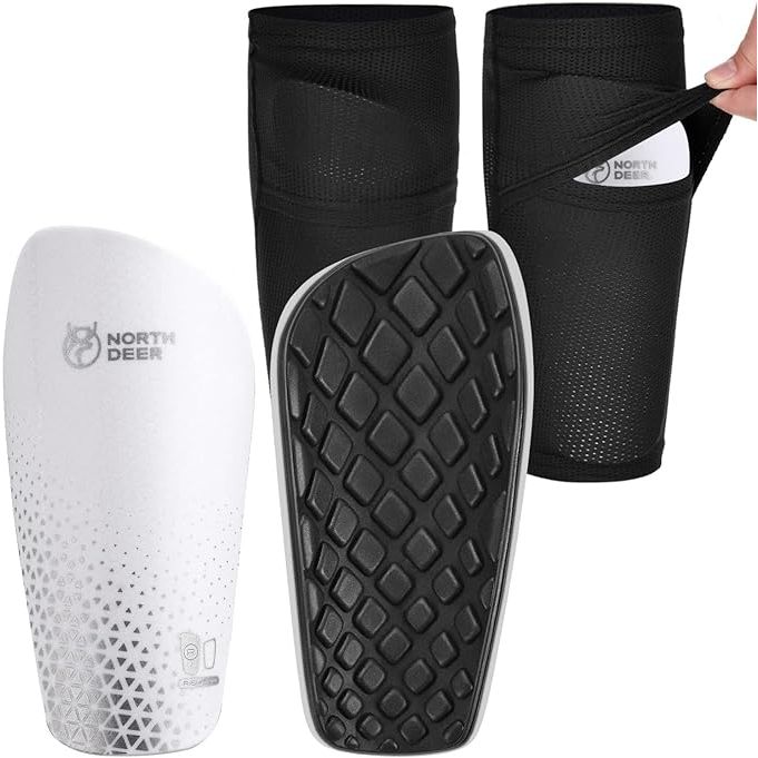 Northdeer Soccer Shin Guards are designed for both kids and adults, providing maximum protection during soccer games. These shin guards come with sleeves that have an optimized insert pocket for easy insertion and removal of the guards. The sleeves are adjustable, ensuring a secure and comfortable fit for boys, girls, men, and women.
