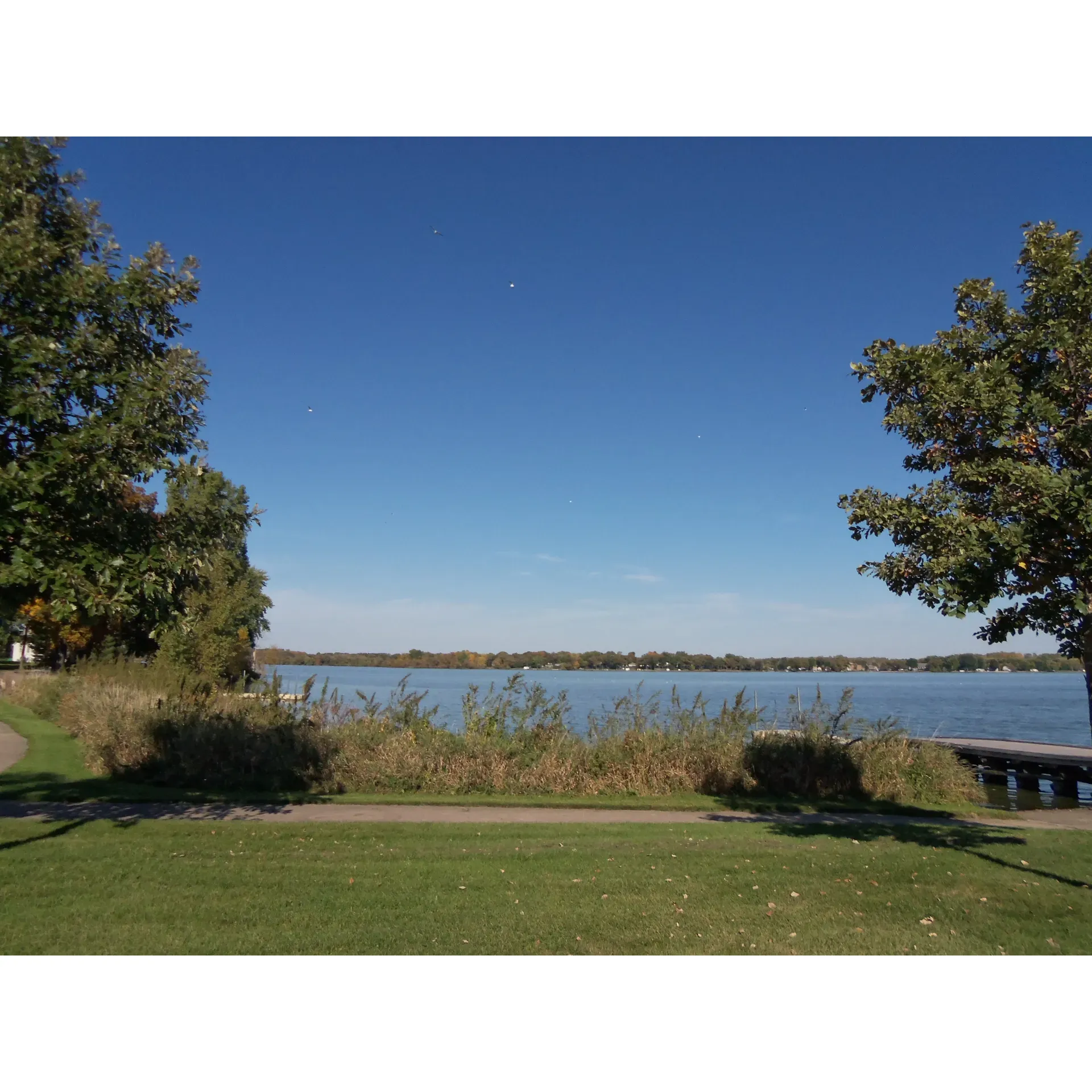 Escape to a tranquil retreat at Derge County Park, a charming campground boasting an exquisite view of Beaver Dam Lake. Here, campers can find generously sized sites that are perfect for both relaxation and outdoor living, all set amidst a landscape of mature trees that offer a welcome respite from the sun. The park is a testament to meticulous care, with grounds that are very well maintained, creating an inviting atmosphere for all who visit.

Cleanliness is held in high regard at Derge County Park, with bathroom and shower facilities maintained to the highest standards, ensuring a comfortable and hygienic stay for guests. For those looking for an extended getaway, the park offers the perfect setting for a weeklong stay, complete with the kind of warm hospitality that transforms a simple trip into a cherished memory. Host Kevin is a gem of the park, frequently seen engaging with guests and offering assistance, his friendly demeanor enhancing the community feel.

While catering to relaxation and fishing enthusiasts—thanks to the accessible boat launch and opportunities to fish directly from the area—Derge County Park also provides a quaint play area for children. This natural haven, with its immense green spaces, is an ideal location for family gatherings or reunions, with ample room for communal activities between the well-spaced sites.

Birdwatchers and nature lovers will delight in the local wildlife, including playful barn swallows that add a touch of wilderness charm to even the rainiest of days. The park's flora is equally engaging, with towering hickory trees and an abundance of bird chatter creating a serene backdrop for any camping experience.

Visitors without a boat can still enjoy a peaceful night or two at the park, taking advantage of the picturesque surroundings and small playground. And for those looking to spice up their stay with a taste of local cuisine, nearby Dockside Bar offers a delectable fish fry and burgers, with convenient docks for those arriving by boat.

Overall, Derge County Park is a hidden gem for those seeking serenity by the water, enchanting green spaces, and a friendly community vibe, all wrapped up in a cozy setting perfect for both fleeting visits and extended stays alike. Description by ChatGPT.