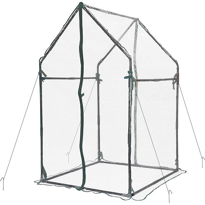 The Gardzen Mini Greenhouse Heavy Duty Portable Green House is a clear tent designed for indoor or outdoor use, providing a protected environment for plants to thrive. Measuring 36.2 inches in length, 36.2 inches in width, and 59.5 inches in height, this compact greenhouse is suitable for small gardens, balconies, or patios.