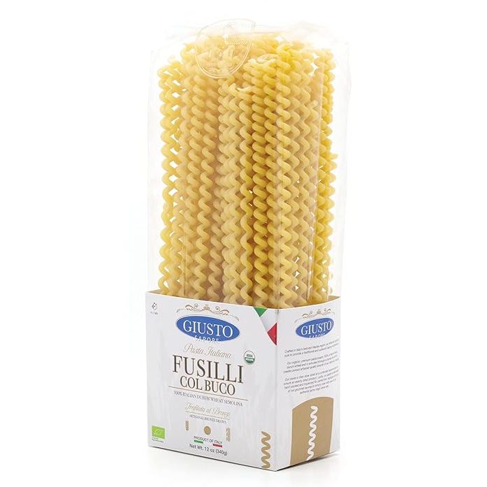 Giusto Sapore Imported Artisanal Fusilli Col Buco Italian Pasta is a high-quality pasta made with organic ingredients. This pasta is bronze drawn, a traditional method that gives it a rough texture that holds sauces better.