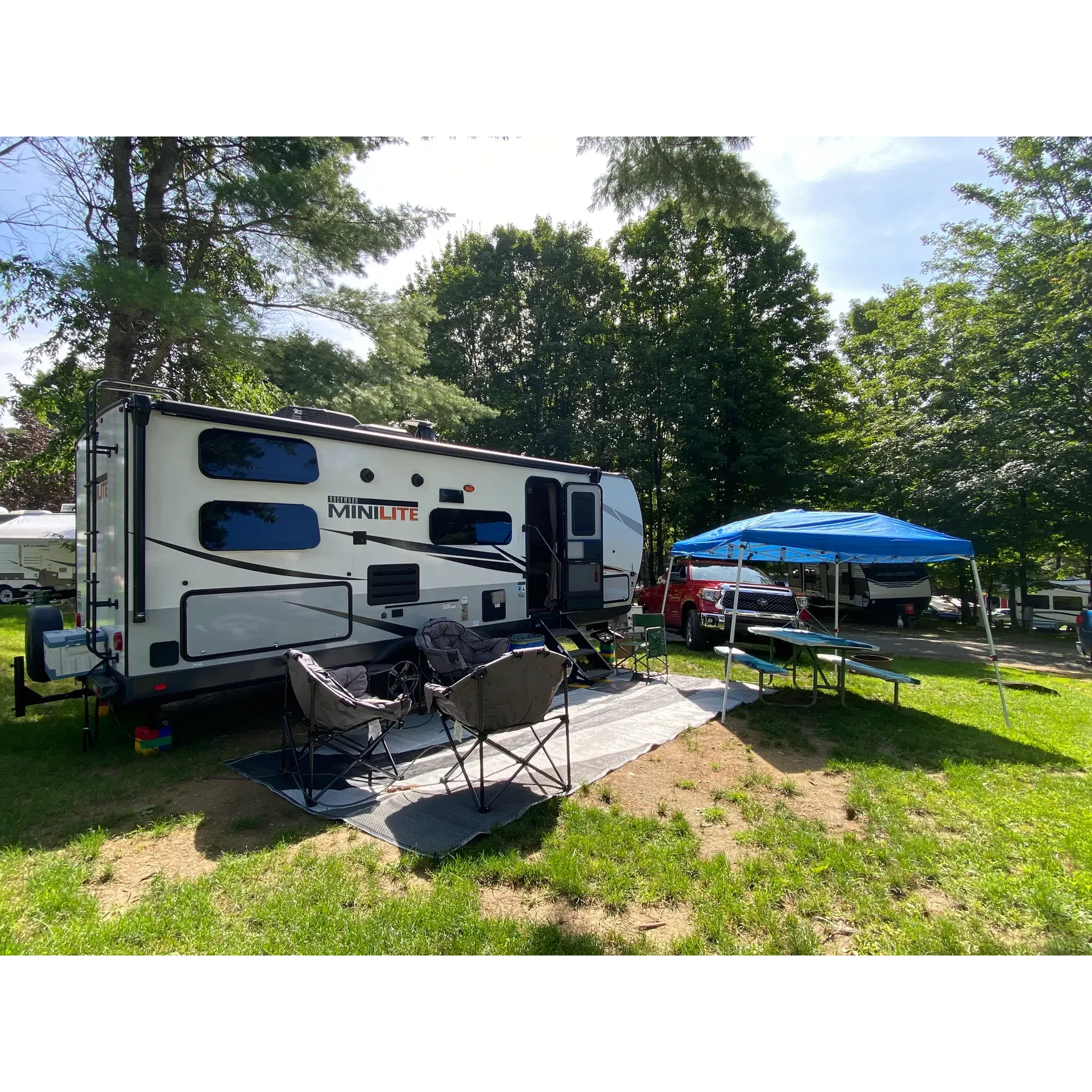 Tree Corners Family Campground emerges as an idyllic escape for families looking to indulge in a joyful bonding experience. The campground brims with numerous amenities tailored to create memorable experiences for children and adults alike. It boasts a vibrant water park complete with exhilarating water slides and two inviting swimming pools, ensuring hours of splash-filled fun for visitors. Additionally, a whimsical sprinkler pad adds to the aquatic delights, providing a safe and delightful play area for the younger guests.

Outdoor activities abound with options like oversized lawn chess, engaging the mind and the body, while scenic wagon rides offer a leisurely exploration of the campground’s picturesque surroundings. The fun continues indoors at the arcade, with a range of games to entertain all ages. For those with a creative flair, the paint n sip events provide a relaxing opportunity to unleash artistic talents while savoring a favorite beverage.

A conscientious commitment to safety is evident with a well-enforced 5mph speed limit, ensuring peace of mind for parents as children embrace the freedom of outdoor play and cycling throughout the campground.

In a world so often dominated by technology, the lack of cell service within the campground is a welcome respite, encouraging guests to disconnect from digital distractions and reconnect with nature and each other. While connectivity is limited, free Wi-Fi is available near the well-appointed main office, which also features a charming gift shop and a delightful ice cream bar for a sweet treat.

Guest accommodations, including clean, spacious cabin rentals, reflect thoughtfulness and attention to the needs of campers. Each site is noted for being well spaced out, allowing for privacy and comfort. The campground maintains a pristine environment, complemented by staff who are consistently praised for providing wonderful experiences.

In addition to the exciting onsite activities, the campground offers an assortment of crafts and games suitable for all tastes and interests. From the water attractions to the cozy and fully stocked cabins, every detail at Tree Corners Family Campground is designed with the ultimate family getaway in mind. Whether you're seeking adventure or relaxation, this destination is one of the premier choices for a fun-filled retreat with family and friends. Description by ChatGPT.