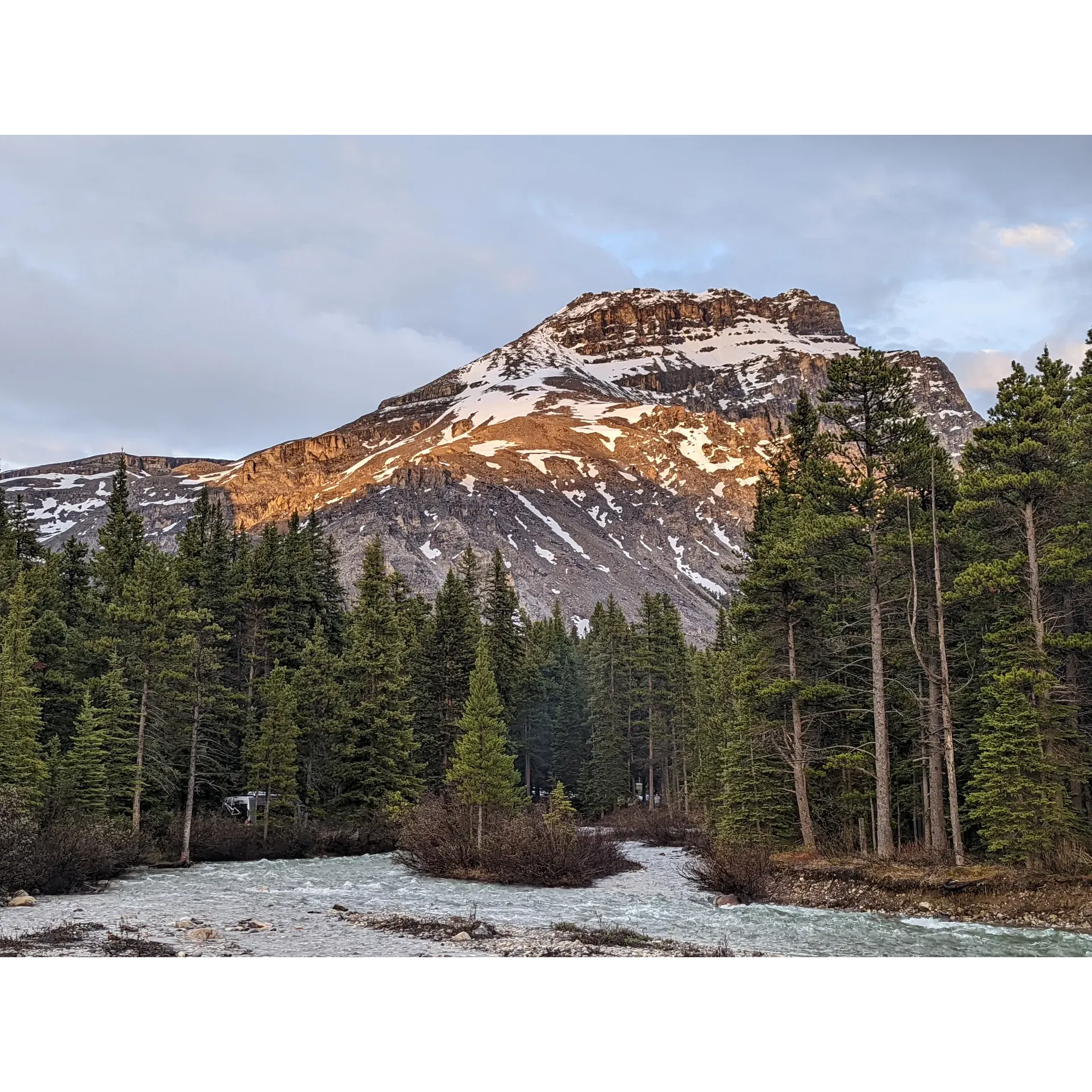 Mosquito Creek Campground is a popular camping destination located in Improvement District No. 9, Alberta, Canada. Situated near the iconic Icefields Parkway, this campground offers stunning views of the surrounding mountains and easy access to nearby hiking trails. The campground is situated along the beautiful Mosquito Creek, allowing guests to enjoy peaceful walks along the water and the soothing sounds of the creek.

The campground offers both tent and RV camping options, with sites that are equipped with picnic tables and fire pits. There are also basic amenities available such as pit toilets and potable water taps. Mosquito Creek Campground is a great base camp for exploring the nearby attractions such as Banff National Park and Jasper National Park, making it a convenient and scenic place to stay while exploring the Canadian Rockies.

Overall, Mosquito Creek Campground offers a serene and picturesque camping experience for those looking to immerse themselves in nature and enjoy the beauty of the Alberta wilderness. The campground's close proximity to hiking trails and scenic viewpoints makes it an ideal choice for outdoor enthusiasts looking to explore the stunning landscapes of the Canadian Rockies. Description by ChatGPT.