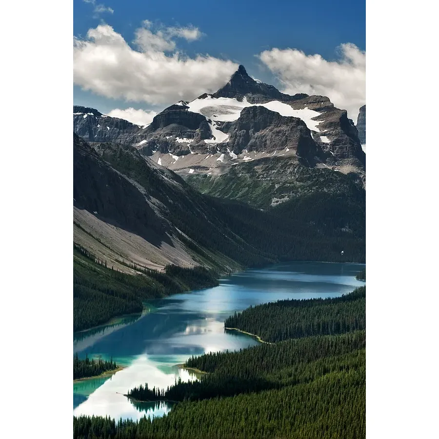 Marvel Lake, a pristine gem in the heart of Mount Assiniboine Provincial Park, is a treasure for adventure-seekers and nature lovers alike. After an exhilarating ascent of Nub Peak, journeyers often find themselves captivated by the allure of Marvel Lake during their Canadian Rockies expedition. As travelers venture through the stunning Wonder Pass, they witness the unfolding canvas of Marvel Lake's spectral beauty, with its distinctive coloration that enchants shutterbugs and painters seeking to capture the quintessence of Canadian wilderness.

Guests who have sojourned through this captivating landscape often share tales of the unrivaled mountain scenery—picturesque vistas that embody the wild heart of Alberta. Set against a backdrop of majestic peaks, the lake's remarkable waters offer visitors a serene respite from the rigors of the trail. It is no wonder that this location has garnered acclamations as one of the most breathtaking sites, with many endorsing it as a must-visit destination.

Encompassing an experience of natural splendor, Marvel Lake is the culmination of Canada's alpine magnificence, presenting an idyllic retreat for those seeking solitude and adventure in one of the world's most superior hiking regions. Here, in this grand expanse, one finds an unspoiled paradise that remains etched in the hearts and memories of all who witness its awe-inspiring beauty. Description by ChatGPT.