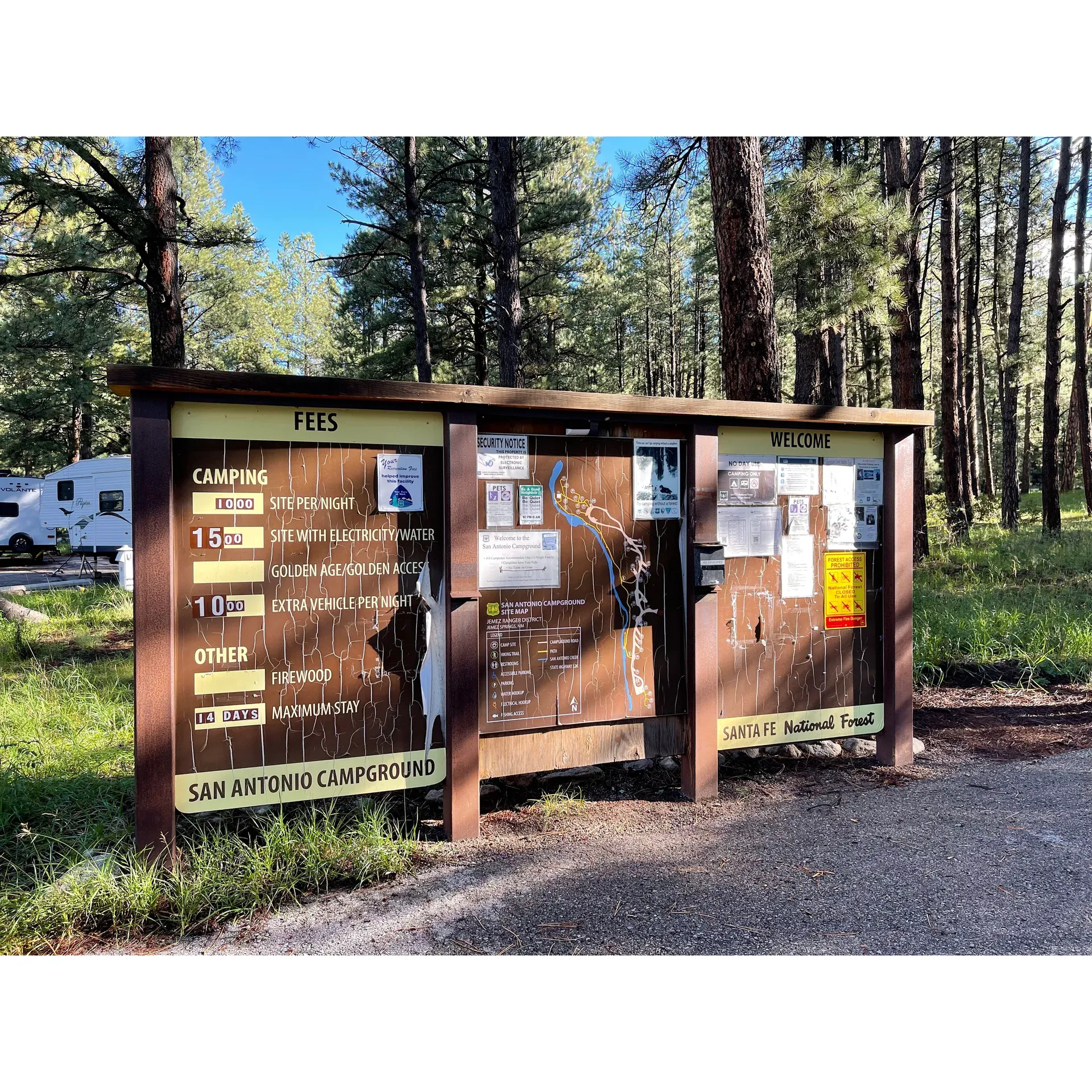 San Antonio Campground emerges as an idyllic outdoor retreat perfect for those looking to immerse themselves in the tranquil delights of nature. Catering to a diverse range of visitors, from solitary campers to bustling group gatherings, the well-appointed campground boasts an array of amenities designed to enhance the camping experience. Each campsite is accompanied by a convenient pavilion space, offering a communal spot for groups to connect and enjoy each other's company amidst the scenic surroundings.

The dedicated campsite for larger groups provides a sense of seclusion and exclusivity while maintaining proximity to the necessary facilities. Equipped with its private restrooms, the group site ensures a comfortable stay without the need to share amenities with the broader campground population, fostering a more personal and intimate setting.

Maintenance is a top priority at San Antonio Campground, with daily service attentive to the cleanliness of the bathrooms and the meticulous upkeep of bear safety trash receptacles. It reflects a commitment to both environmental stewardship and guest satisfaction. While the individual campsites are accessible via a short path — adding to the charm of seclusion and natural immersion — guests are encouraged to bring a wagon to facilitate easy transport of gear.

Rich in natural beauty, the campground is a stone's throw away from a pristine stream that invites families to wade, fish, and relish the peaceful sounds of flowing water. It is a place where serenity meets adventure, with walking trails meandering through the mountainscape for those looking to explore the area's lush vistas.

Though cell service may be limited, such detachment from digital connections encourages a more authentic outdoor experience, where the beauty of the Jemez Mountains can be appreciated without distraction. Should one need to reconnect with the outside world, Wi-Fi service is available a short drive away at the local store, conveniently located just 8 minutes from the campground.

San Antonio Campground is not just a place to pitch a tent but a serene destination where every sense is awakened by the majesty of nature — from the stunning vistas to the harmonious melodies of the local creek. With amenities such as potable water, picnic tables, fire rings, and electricity and water hookups, the campground has considered the comforts of home while enveloping guests in the splendor of the great outdoors. It stands as a true jewel for those who seek a reasonably priced getaway and cherish the timeless allure of camping amidst the mountains. Description by ChatGPT.