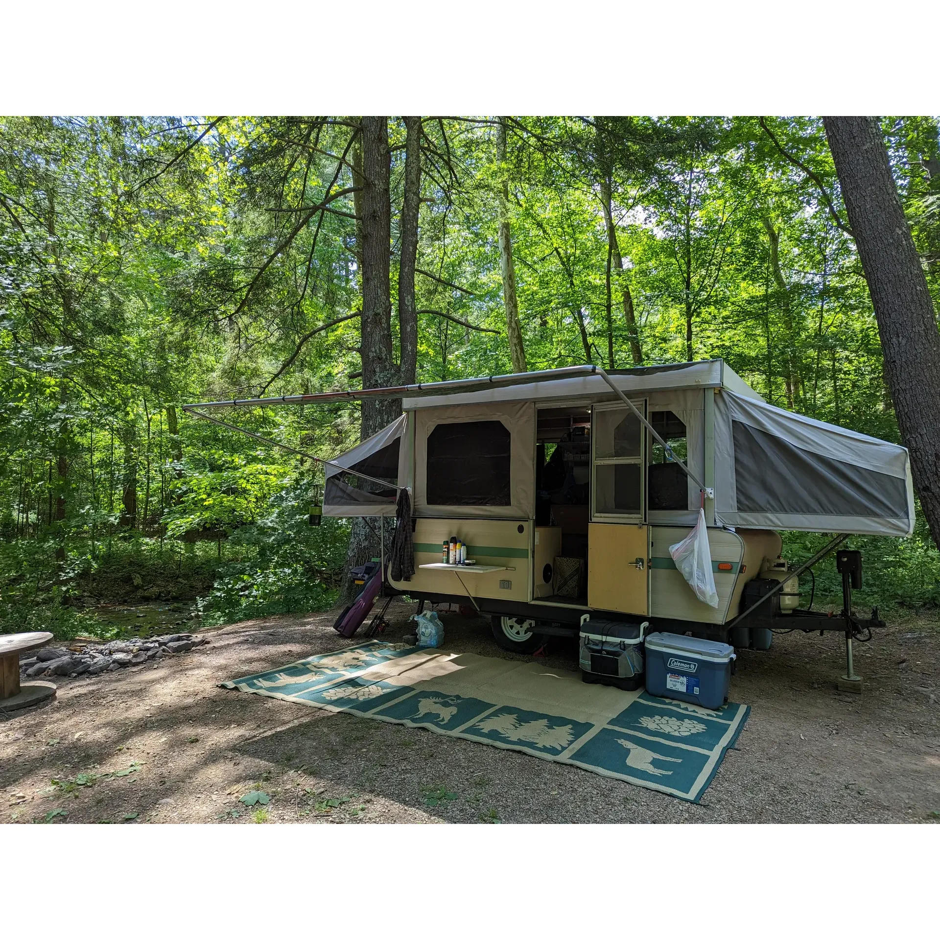 Hone Quarry Campground offers a serene and intimate camping experience amidst a picturesque landscape. With around ten beautifully maintained sites, visitors can enjoy the tranquility of the great outdoors along with the convenience of well-thought-out campsite features. Each site provides a tent pad for comfortable sleeping arrangements, a picnic table perfect for outdoor meals or gatherings, and a fire ring to enhance the cozy camping atmosphere with a warm fire or a toasty marshmallow roast.

The ample distance between the campsites, separated by natural foliage, ensures semi-privacy, giving campers their own slice of the woodland to relish. An added benefit is that the grounds are accessible via a paved road, making it hassle-free for travelers wishing to explore this lovely destination with ease. A small fee is efficiently managed through a drop box system, so campers are encouraged to come prepared with cash to secure their spot upon arrival.

Well-maintained pit toilets offer a clean and environmentally friendly option for guests. The peaceful surrounding nature not only provides a backdrop for relaxation but also awaits the adventurous spirits with opportunities to hike, fish, and partake in water activities such as kayaking in the scenic quarry during warmer months.

Hone Quarry Campground is an ideal choice for families and friends who cherish creating lifelong memories through camping, fishing, and immersing themselves in mountain escapades. It's a beautiful, tranquil retreat that serves as the perfect gateway for both seasoned hikers and those looking to unwind by the waterfront or under the canopy of stars. Description by ChatGPT.