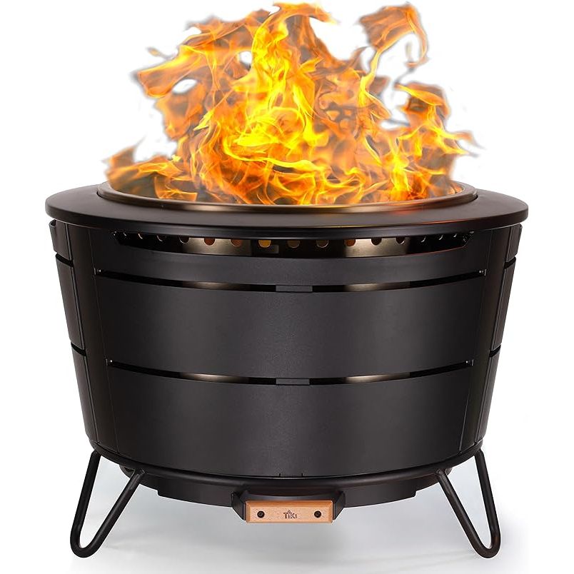 The TIKI Brand Reunion Smokeless Fire Pit is a large wood-burning outdoor fire pit designed for large gatherings. It measures 27.5x27.5x20 inches and features a modern design with a removable ash pan for easy cleanup. This fire pit is smokeless and includes a starter pack, making it convenient and user-friendly for outdoor entertaining.