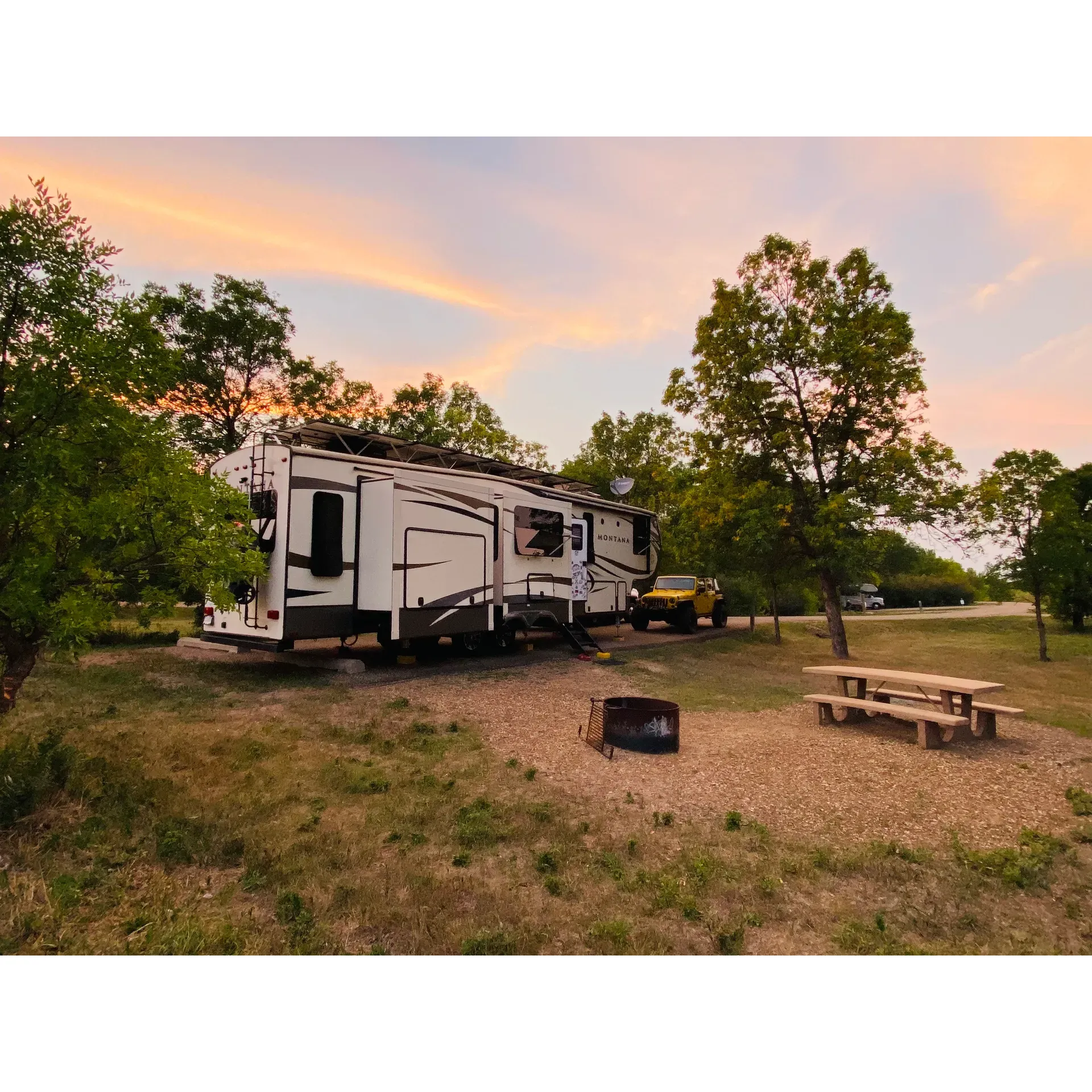 Buffalo Gap Campground, managed by the US Forest Service, offers a delightful respite for travelers on a cross-country journey or those seeking a tranquil outdoor experience. Boasting exceptionally tidy and spacious campsites complemented by well-paved access roads, this campground caters to the convenience and comfort of its guests.

Visitors will be greeted warmly by congenial hosts and can enjoy the ease of available amenities, including close-by potable water sources to keep you refreshed throughout your stay. The picturesque setting provides an opportunity to ascend a little hill within the campground to behold a breathtaking vista that captivates both the eye and the soul. Set against a serene backdrop, Buffalo Gap provides a mostly quiet atmosphere with the hushed whispers of nature's own lullabies, only occasionally livened by distant passing traffic.

The campground’s generous, flat sites make pitching a tent an effortless task, with each spot featuring a deep fire pit thoughtfully designed to shield from the brisk winds. The well-maintained grounds further boast lush greenery, lending shade and beauty to the area. A sense of adventure is only a few steps away as the campground serves as the starting point for several walking trails, beckoning those eager to explore the surroundings on foot.

Keeping guests refreshed, the campground proudly offers shower facilities, a feature that is highly appreciated after a day of hiking or long travel. The campgrounds are pet-friendly and offer a close encounter with nature, where one can capture the splendor of the stars in the night sky with their camera—the celestial view here is simply unparalleled.

Conveniently situated just north of the interstate and approximately six miles west of Medora, Buffalo Gap Campground is not only easy to reach but also provides an idyllic base for exploring nearby attractions. Ensuring fundamental hygiene needs, the campground is equipped with flush toilets and private showers, adding to the comfort of your outdoor living. Friendly campground hosts are always on hand to offer guidance and help enhance your stay.

With its alluring blend of convenience, comfort, and natural splendor, Buffalo Gap Campground is an ideal spot for a serene getaway or a refreshing stopover amidst your travel adventures, offering an experience that guests cherish and often return to savour again. Description by ChatGPT.