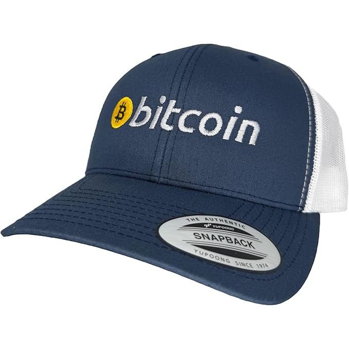 The Bitcoin Trucker Cap Navy/White is a stylish accessory perfect for digital currency enthusiasts and investors, like those in the Bitcoin space. With a modern design and classic navy and white colors, this cap is ideal for complementing the look of anyone interested in the cryptocurrency market.