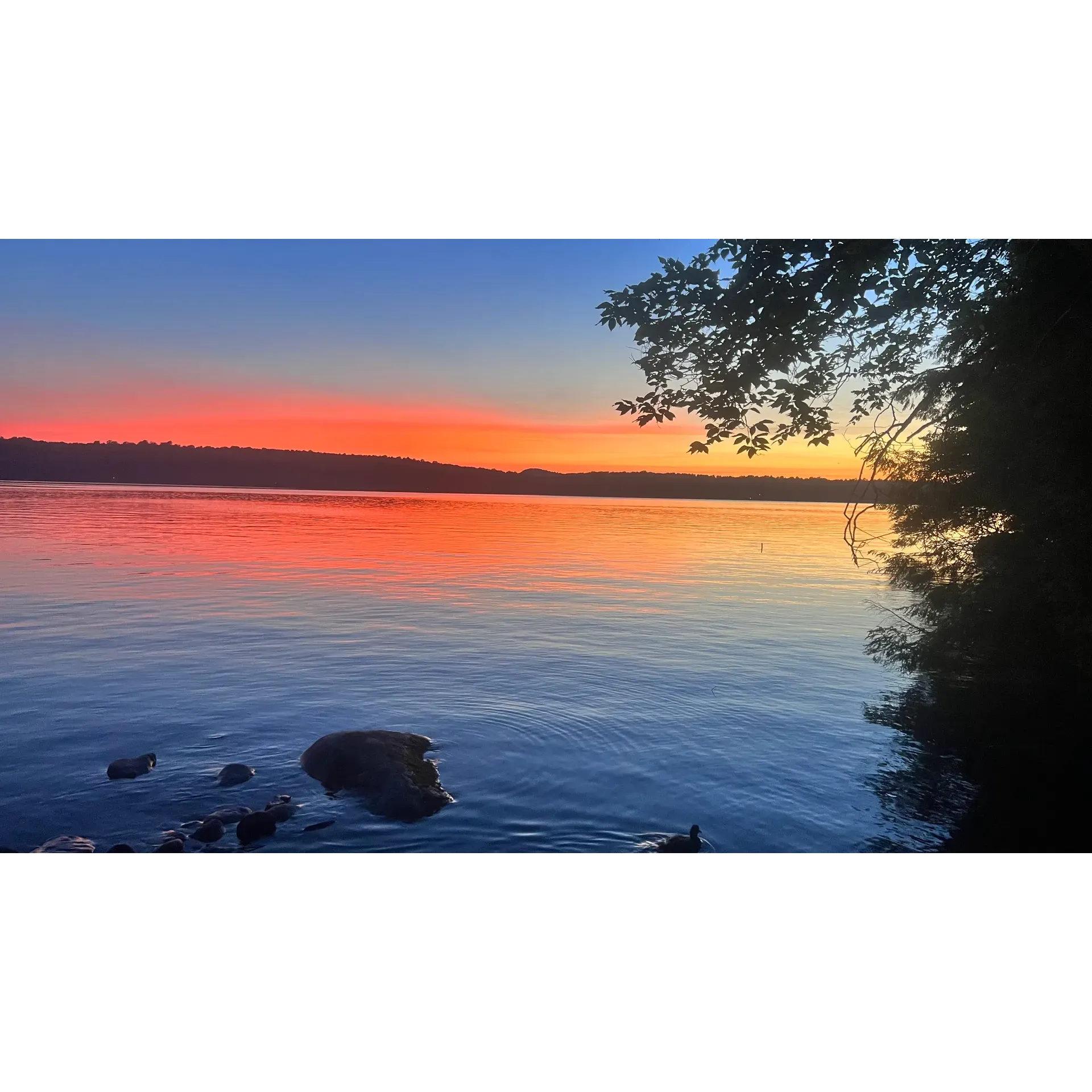 Cranberry Lake Campground is a pristine outdoor retreat offering a memorable escape with its beautiful lakeside vistas and an array of outdoor activities. This well-maintained campground is a haven for tent camping enthusiasts and smaller camper vehicles. With a selection of campsites tailored to provide a cozy and intimate connection with nature, guests can look forwards to level grounds, lush privacy, and ample shade. Each site features well-conditioned fire pits and tables, setting the stage for the quintessential campfire experience.

The campground’s commitment to cleanliness and convenience is evident with strategically located, excellently-maintained toilet facilities and drinking water spigots. Guests can revel in the simple pleasures of outdoor life, enhanced by a magnificent sand beach perfect for an invigorating swim in crystal-clear waters. For those seeking activities beyond the camp, Bear Mountain and High Falls trails are accessible nearby, offering breathtaking hikes and the serenity of unspoiled nature.

Anglers can enjoy serene fishing experiences on the lake, although the fish may prove elusive at times, adding to the adventure of the stay. Understanding that campers value convenience, the site offers well-priced, bone-dry hardwood firewood for those idyllic evenings spent under the stars.

Adding to the camping charm, the friendly and proactive camp manager, along with the hospitable staff like Carly, ensure a warm welcome and a helping hand to fulfill each visitor’s requests, aiding in an unforgettable camping experience. The campground’s peaceful atmosphere extends to the tranquil waters, beckoning kayaking enthusiasts to explore at their leisure.

For guests seeking a simpler, more authentic camping experience by the water and the tranquility of nature’s embrace, Cranberry Lake Campground is an ideal destination, creating a picturesque setting for making lasting memories. With thoughtful amenities and personal touches of service, each stay promises to be as serene as the reflective lake waters at sunset. Description by ChatGPT.