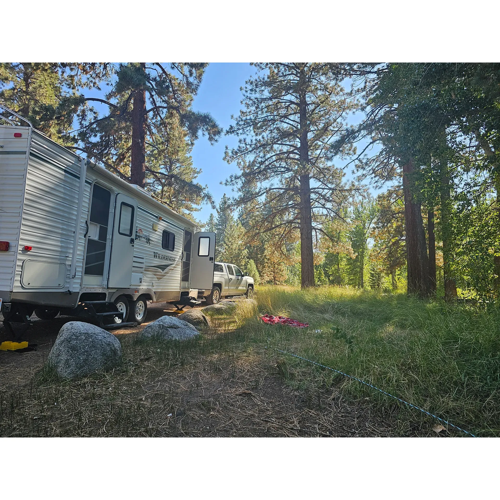 Markleeville Campground offers a serene and picturesque outdoor experience for campers looking to immerse themselves in the beauty of nature. The campground is favorably reviewed for its prime location, with several sites situated right by the gentle sounds of the flowing river, providing a tranquil soundtrack to an evening under the stars. Guests frequently commend the friendly and engaging locals who enhance the laid-back, relaxing atmosphere of the campground.

Enjoyment at Markleeville Campground is amplified by the presence of a dedicated camp host, known for exceptional service and creating a welcoming environment. Campers can find both shaded and sun-dappled sites, catering to personal preferences and ensuring comfort throughout the day. Additionally, the access to Markleeville Creek enhances the natural allure of the campground, making it a standout choice for many.

The campground's limited capacity amplifies its charm, offering an intimate setting that ensures a quiet and peaceful stay. While the campground encourages a true disconnect from digital distractions due to the lack of Wi-Fi or cell service, it is often praised for the unforgettable sunrises that greet visitors each morning—an opportunity to connect with nature's splendor.

Practical amenities such as a dumpster, vault toilet, and a water station for dishwashing are available to guests, ensuring basic comforts are met without compromising the rustic camping experience. For those keen on hiking, a short drive from the grounds will lead to stunning trails, since the campsite is surrounded by private property.

Markleeville Campground is regarded as a treasured retreat for those in search of solitude, natural beauty, and an escape from the bustle of daily life. With no reservations required and a first-come-first-served policy, it's an accessible option for spontaneous adventurers and seasoned campers alike. Description by ChatGPT.