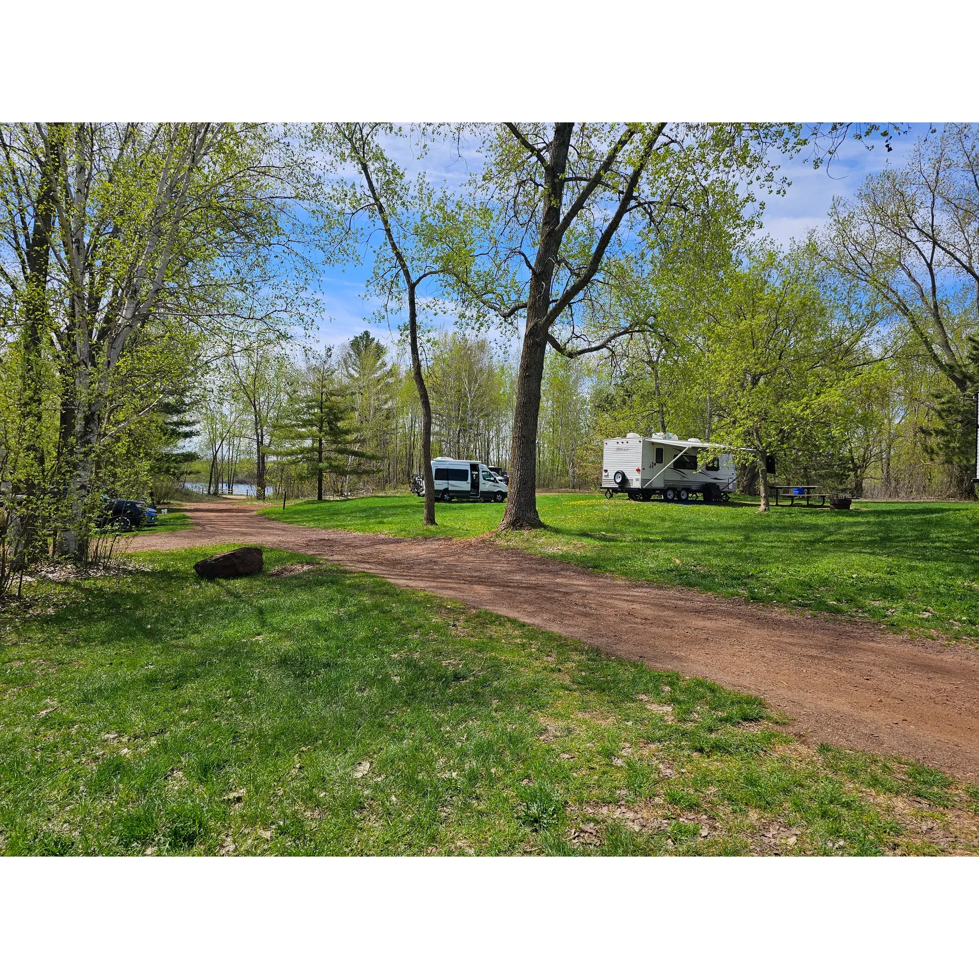 Portsmouth Campground offers a serene and engaging outdoor experience with its proximity to picturesque Portsmouth Lake and a variety of recreational activities. Ideal for nature lovers and adventure enthusiasts, the campground boasts easy trail access and a brief, scenic walk to a delightful sandy beach, perfect for paddleboarding or simply soaking up the sun by the clear and cool waters.

Outdoor explorers can relish the well-maintained mountain biking trails that wind through the lush surroundings, offering endless fun for riders of all skill levels. With an extensive network of trails, visitors can spend days on end discovering new paths and the natural beauty of the area.

For those interested in more than just biking, the campground's location facilitates a range of activities including fishing, kayaking, hiking, and even scuba diving, thanks to the astonishing clarity of the local lakes. The peaceful mid-week atmosphere is perfect for those seeking a tranquil escape, where the sounds of nature provide a stunning backdrop.

Convenience is key at Portsmouth Campground, with Ironton and Crosby just a short bike ride away. Guests can indulge in local culinary delights, grab a coffee at the Red Raven, or pick up any necessary supplies and groceries in these charming nearby towns.

Campers looking for traditional Minnesota state park camping will appreciate the rustic charm and direct access to outdoor activities. With lovely beach spots and trail connections to Cuyana, Portsmouth Campground is an exceptional choice for a memorable nature retreat with the luxury of nearby conveniences and small-town charm. Description by ChatGPT.