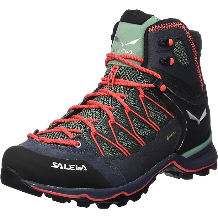 The Salewa Mountain Trainer Lite Mid GTX is a women's hiking boot designed for lightweight alpine trekking and scrambling. It features a mid-cut design for ankle support and protection, as well as a Gore-Tex membrane for waterproof and breathable performance in various conditions.