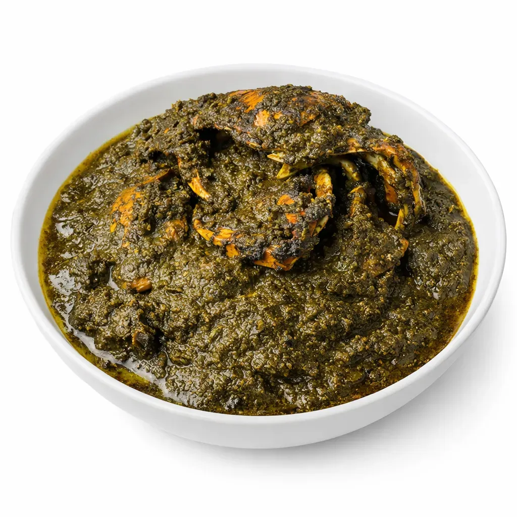 Experience a journey to Central and West Africa with this sumptuous Cassava Leaf Stew featuring vibrant cassava leaves, smoky meats, and nutty peanut paste, traditionally enjoyed with rice.