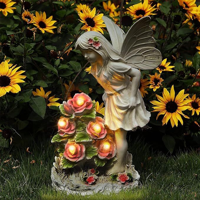 The Garden Figurines Angel Garden Statue is an outdoor decor piece made of durable resin and measures 12.8 x 7.5 x 6.1 inches. This solar-powered sculpture features 5 LED lights that illuminate the angel's wings, creating a charming and peaceful ambiance in your garden, patio, lawn, yard, or porch.