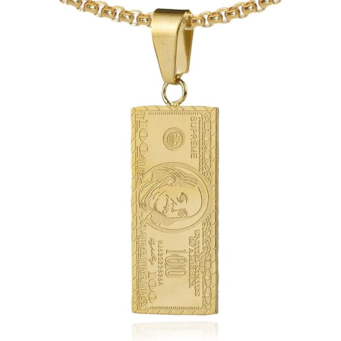 The Fashion 18K Gold Plated Money Dollar Pendant Necklace is a stylish and eye-catching piece of jewelry that features a pendant in the shape of a dollar sign. It is plated with 18K gold, giving it a luxurious and expensive look without the high price tag.