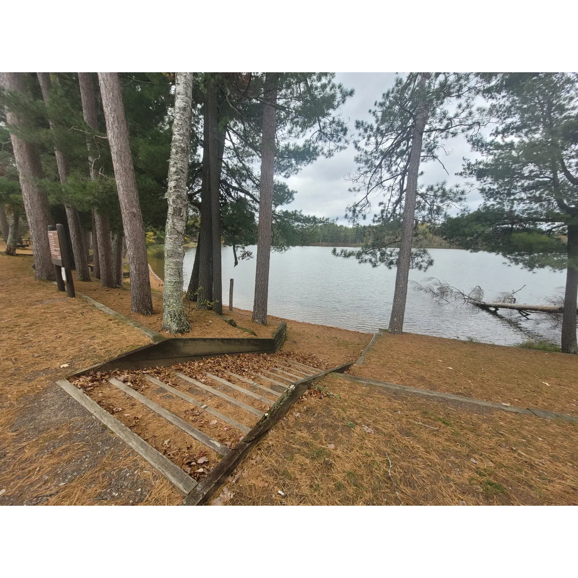 Savanna Portage State Park Campground offers an idyllic retreat for nature lovers seeking a serene getaway. Surrounded by a verdant canopy that ensures privacy, campers can relish the spaciousness of each site, creating a personal haven for relaxation and enjoyment of the great outdoors. It's a paradise for children and anglers alike, with the fishing pier providing ample opportunity to reel in an impressive haul of sunfish while basking in the glory of a lakeside afternoon. Visitors can also take pleasure in the refreshing swimming area on Loon Lake, offering a delightful respite on warm days.

Attention to detail is evident in the cleanliness and maintenance of the facilities, with restrooms and showers consistently kept in pristine condition, reflecting the campground's commitment to guest comfort. The staff at Savanna Portage State Park Campground mirror the surrounding tranquility, renowned for their friendly demeanor and eagerness to assist guests in making the most of their visit.

For those with a spirit of adventure, the park boasts an extensive array of hiking trails that cater to every level of experience, from leisurely strolls to more strenuous treks through the scenic wilderness. Each path promises new discoveries and picturesque vistas that encapsulate the beauty of this peaceful park. Visitors seeking solitude and scenic beauty will find the tranquil ambiance of the campground both inviting and rejuvenating. Whether you're looking to indulge in the quietude of a good book under a canopy of leaves, or seeking to explore the park's natural wonders, Savanna Portage State Park Campground is an exceptional choice for a memorable outdoor experience. Description by ChatGPT.