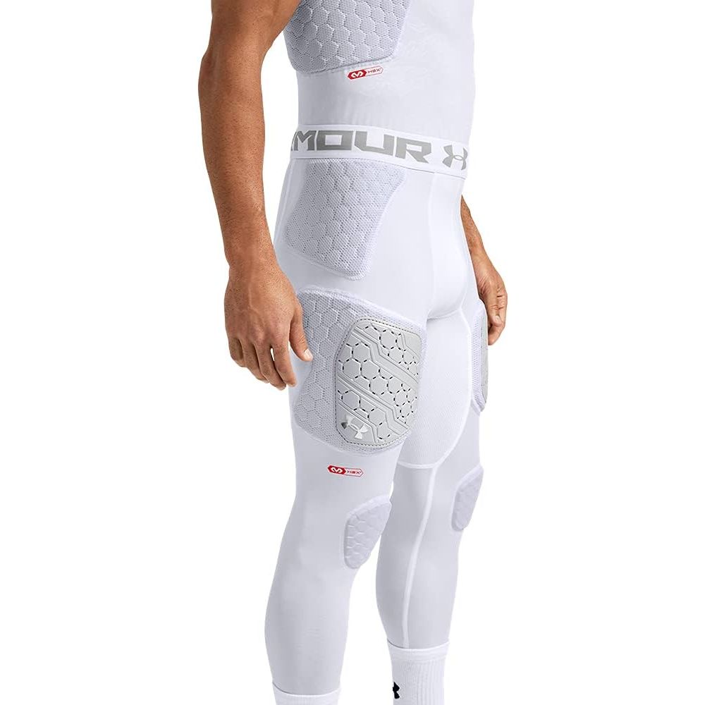 The Under Armour Men's Gameday Pro 7 Pad Tight is a compression fit bottom designed to provide added protection during contact sports such as football and rugby. The tight features 7 integrated pads strategically placed on the hips, thighs, knees, and tailbone for maximum impact absorption and protection.