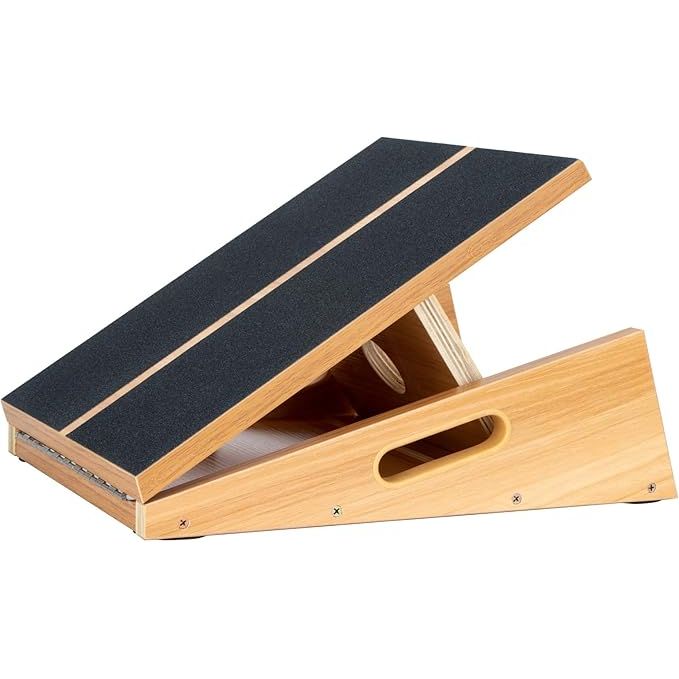 The StrongTek Professional Wooden Slant Board is a high-quality fitness tool designed to aid in stretching and strengthening the lower legs, particularly the calves and Achilles tendons. Made from premium materials, this adjustable incline board is constructed with solid wood to ensure durability and longevity.
