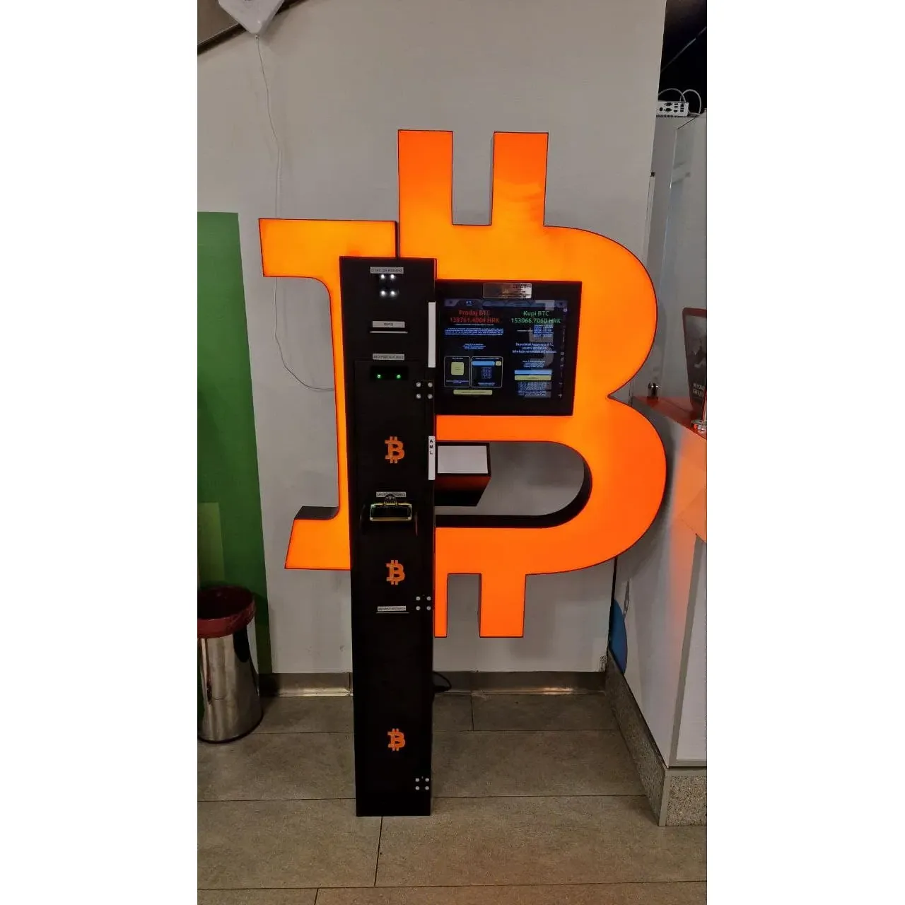 Shitcoins.club's Bitcoin ATM, affectionately known as the Bitcoin Bankomat, stands as a beacon of digital currency convenience, providing seamless access to Bitcoin transactions for the modern consumer. Garnering acclaim for its reliability and ease of use, this state-of-the-art terminal invites users to effortlessly engage with the world of cryptocurrency.

Enthusiasts and novices alike are welcomed to a user-friendly interface that simplifies the buying and selling process, fostering a hassle-free experience. The Bitcoin Bankomat is heralded for its efficient operation, where transactions are not only streamlined but also executed with precision and speed, ensuring that patrons are able to manage their digital assets promptly.

With the glowing endorsement of its users, who frequently recommend the Bitcoin ATM for its consistent performance, it's clear that the Bitcoin Bankomat by Shitcoins.club stands as a premier choice for those looking to conveniently transact in Bitcoin. Whether for investment purposes or as a means to adopt a digital currency lifestyle, this ATM provides a trustworthy and professional service that aligns with the needs of the forward-thinking consumer. Description by ChatGPT.