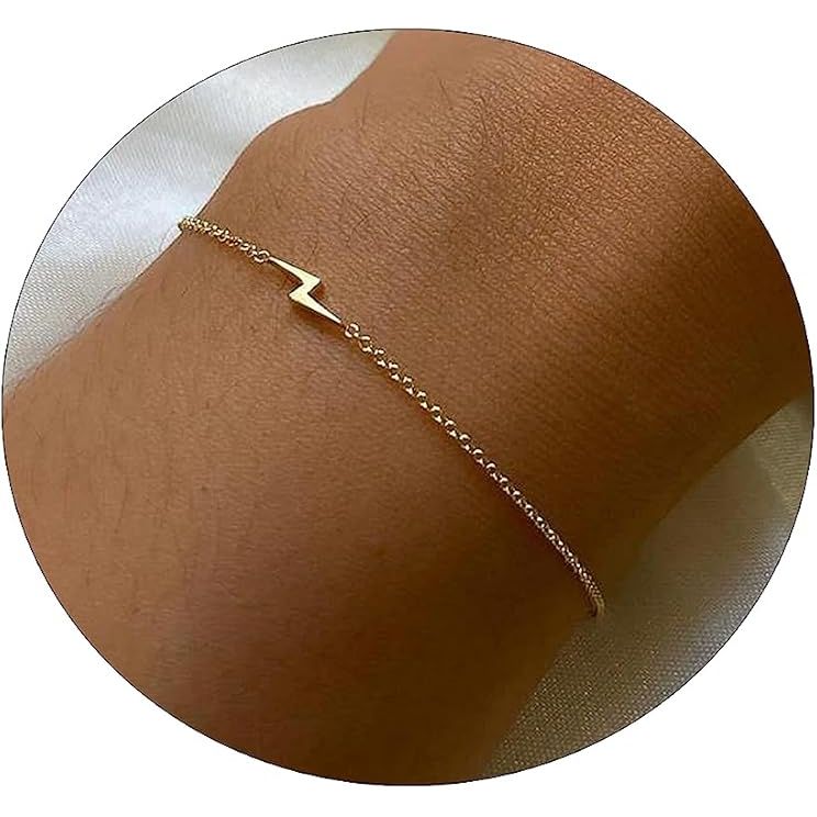 The Dainty Gold Bracelet for Women is a stylish and elegant piece of jewelry that is 14K gold plated. It is designed to be lightweight and comfortable for everyday wear. The bracelet features a variety of chain styles, including herringbone, twisted rope, and box mesh, giving it a unique and trendy look.