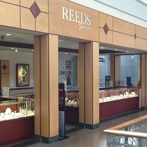 REEDS Jewelers shines as a beacon of exceptional customer service and personal attention, captivating hearts with its dedication to creating unforgettable moments for its clientele. Customers delight in the warm and personal touch offered by associates such as Barb, who is repeatedly praised for her meticulous attention to detail and unwavering commitment to crafting the perfect celebratory ambiance, whether it be for an anniversary, engagement, or a simple gesture of love. The staff's sincere investment in customer satisfaction transforms ordinary shopping experiences into cherished memories.

Clients glow with appreciation for the accommodating and flexible nature of the team at REEDS, emphasizing the care with which associates like Barb listen to and realize the visions of those seeking the perfect piece for their loved ones. Their personal approach, paired with accessibility and responsive communication, ensures that every customer leaves feeling understood and valued. This heartfelt service extends even to those seeking everyday assistance, such as replacing a watch battery, where the staff eagerly shares knowledge and expertise, inviting customers to become part of the REEDS family.

The REEDS Jewelers experience is further enhanced by the impeccable presentation and professionalism maintained by the entire team. Associates like Robert, Barry, and Eric uplift the tradition of outstanding customer service by engaging guests with charm and grace, leaving a lasting impression of refinement. From the thoughtful arrangement of a display window to the presentation of diverse collections including popular Alex and Ani bracelets, each aspect of the store manifests a commitment to elegance and quality.

Priding itself on integrity and accountability, REEDS Jewelers stands out for its willingness to go above and beyond in service resolution. When faced with challenges, the staff at REEDS exhibits exceptional problem-solving and a genuine desire to ensure customer satisfaction, offering solutions and compensation that speak to their strong ethos and reputation.

At REEDS Jewelers, every interaction is more than a transaction—it's an opportunity to reinforce a legacy of trust, excellence, and joy in the world of fine jewelry. Description by ChatGPT.