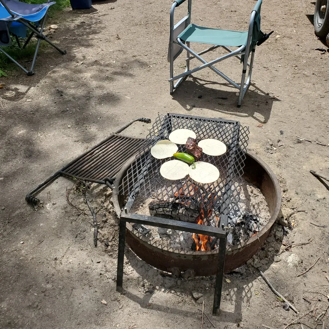 Barney's Campground offers an idyllic outdoor experience, providing campers with prime access to sparkling waters and a picturesque beach setting. At camp spot #5, guests delight in the convenience of being just steps away from well-maintained restroom facilities and the serene beauty of the natural surroundings. While exploring the campground, campers are encouraged to bring their own water supply for added comfort.

The campground's splendor is evident with its breathtaking scenery and wildlife, making it a photographer's paradise. Each site is thoughtfully laid out, ensuring easy navigation and privacy for guests. Spot #8, a favorite among visitors, offers spacious arrangements, though the thoughtful reminder for newcomers is to enter and exit through the designated point to maintain the tranquil atmosphere.

Cleanliness and whimsy go hand-in-hand at Barney's Campground, with restrooms praised for their neatness and unique glow-in-the-dark artwork that adds a touch of enchantment, particularly to the younger guests. The glow in the dark features add an element of surprise and wonder, creating unforgettable memories for families.

For fishing enthusiasts, the campground is a haven with excellent angling opportunities complemented by a pristine campsite environment. While the occasional breeze may add a zest to the day's activities, it contributes to the exhilarating feeling of being at one with nature.

Boating aficionados will appreciate the convenience of the campsites' proximity to the shoreline, allowing them to seamlessly secure their boats close by and enjoy the water at their leisure.

Barney's Campground is a splendid retreat for outdoor lovers seeking a harmonious blend of relaxation, recreation, and the beauty of the great outdoors. Whether you're pitching a tent or pulling up with a trailer, the campground strives to offer a delightful escape with a focus on creating a welcoming atmosphere and cherished experiences for all its visitors. Description by ChatGPT.