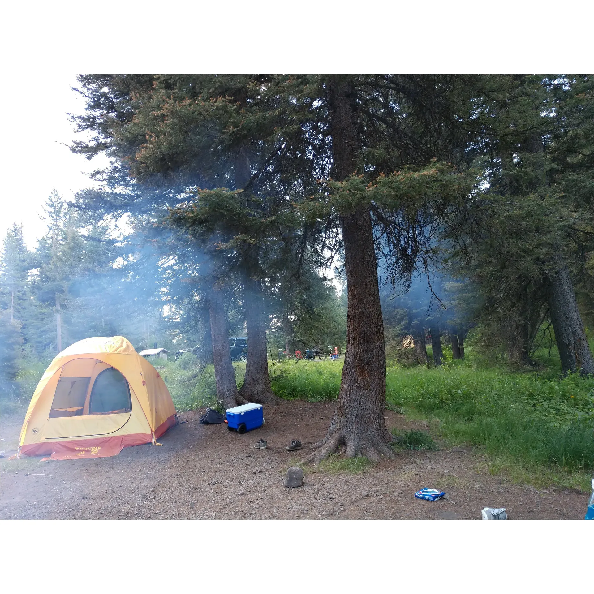 Caribou Campground is a serene oasis for those seeking a quiet retreat in the great outdoors. Visitors to this campground are welcomed by the soothing sounds of a nearby stream, offering a picturesque and tranquil setting for camping enthusiasts. The area presents well-maintained and clean camp sites, both for traditional tenting and for RVs, with specific accommodations providing solid grounds for trailers or motorhomes.

Among the multitude of charms highlighted by guests, the deep fire pits and available picnic tables at each site add a touch of comfort to the rustic experience. The campground's emphasis on nature conservation is evident through friendly reminders about the local wildlife, encouraging campers to practice bear safety and environmental responsibility.

The accessibility of Caribou Campground is marked by its well-kempt roads, which, while rough, remain passable for passenger vehicles—making it an ideal destination for those looking to escape the more frequented campgrounds. The proximity to the river's gentle roar only amplifies the sense of seclusion offered here, allowing guests to fully immerse themselves in nature's symphony.

With limited sites that prioritize privacy, visitors can enjoy the company of wildlife and varied critters, contributing to the experience of being closely connected with nature. Although the campground may not offer extensive amenities, the basic necessities, such as garbage disposal and a vault toilet near the entrance, ensure a comfortable stay. 

Affordably priced, with consideration for senior guests, the value presented by Caribou Campground can be measured in the quality of its peaceful setting, the cleanliness of the natural environment, and the opportunity to find one's 'official happy place' amid the beauty of the great outdoors. Description by ChatGPT.