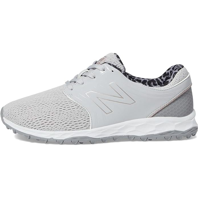 The New Balance Women's Fresh Foam Breathe Golf Shoe is designed specifically for female golfers seeking a comfortable and stylish option on the course. The shoe features a lightweight, breathable upper made of mesh material to keep your feet cool and dry during long rounds of golf.