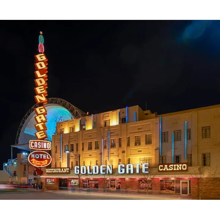 At the Golden Gate Hotel & Casino, experience the vibrant heart of Las Vegas blended with a rich history of hospitality. This iconic establishment enjoys a prime location at the start of the famous Strip, offering guests immediate access to the electric nightlife and entertainment that the city is renowned for.

The hotel boasts a range of rooms that provide a welcoming atmosphere with a touch of classic charm. Guests with a penchant for vintage vibes will appreciate the quaint stylings and the unique feature of windows that open to let in the city's energy. For those desiring a more luxurious stay, the available suites present a spacious retreat where comfort meets style. Outfitted with plush bedding, impeccable climate control, and sumptuous showers, these suites ensure relaxation and satisfaction for every guest.

Service at the Golden Gate Hotel & Casino is highlighted by the thoughtful and attentive staff. Guests who have experienced unexpected events have praised the team for their exceptional care and responsiveness, making stays more pleasant even under less than ideal circumstances. The warmth and professionalism of the service-team leaves a lasting impression, evidenced by repeat visits and heartfelt recommendations.

The casino floor buzzes with excitement, offering a gambling experience second to none. Patrons indulge in a variety of games complemented by the lively atmosphere and a continuous flow of perfectly chilled drinks. The service at the bars is top-notch, ensuring that fun-seekers can enjoy a memorable night without ever needing to leave the premises.

An added perk of staying at the Golden Gate is the complimentary access to the awe-inspiring Circa’s stadium pool, a modern oasis that invites travelers to a refreshing and luxurious escape.

Embracing the spirit of Las Vegas, the Golden Gate Hotel & Casino stands as a testament to the allure of a city that never sleeps, combined with the embrace of tradition and a reputation for service that makes guests feel valued and eager to return. Whether drawn by the charm of yesteryear or the excitement of the present, a stay at this emblematic property promises to be an integral part of the Las Vegas adventure. Description by ChatGPT.