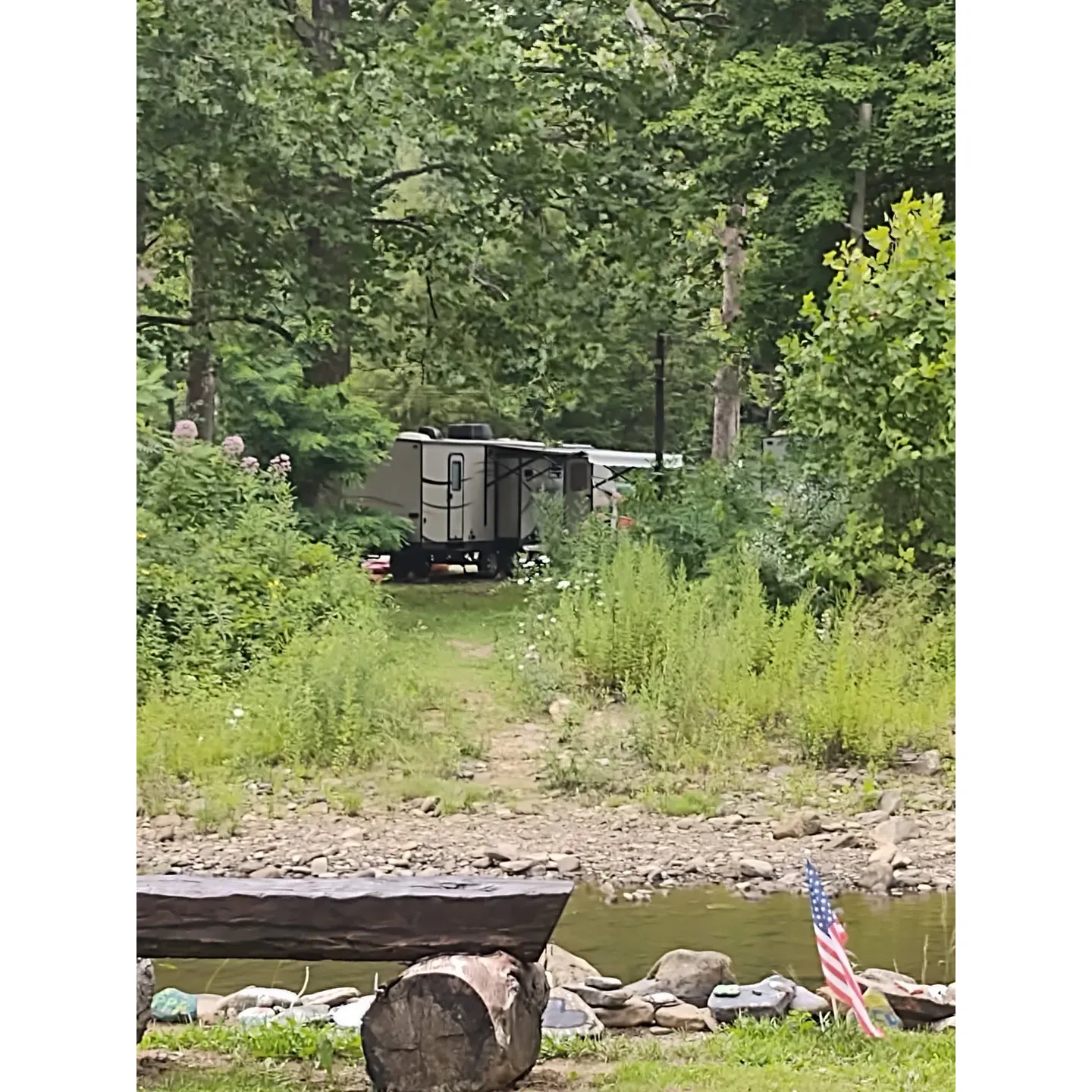 Marlowe's Scenic River Campground emerges as an idyllic retreat for families and outdoor enthusiasts alike. This verdant oasis provides a plethora of amenities to ensure comfort in the wilderness, including electric and water hookups at each campsite, clean and accessible shower facilities, and the convenience of a charming on-site store stocked with ice cream, snacks, and even fishing bait for those looking to reel in their next big catch.

Visitors revel in the range of activities available, from engaging in games of bingo to enjoying live band performances, particularly during special occasions like Memorial Day, when the campground buzzes with celebratory energy. With options to house campers on both tent sites and in rental campers, the flexibility to accommodate different styles of outdoor living is a testament to the campground's thoughtful approach to guest experiences.

The family-friendly atmosphere is underscored by a welcoming environment where both children and pets can find joy and adventure. With the campground adjacent to the Allegheny River, adventurous spirits can embark on kayaking or canoeing excursions, while the nearby creek offers the perfect setting for swimming and fishing.

Moreover, the landscape accentuates a small camp's charm, complete with unique features such as a picturesque rope bridge that adds a touch of whimsy to the natural surroundings. Campsites are well-appointed with full hookups to cater to those with campers, ensuring convenience without compromising the rustic experience.

Marlowe's Scenic River Campground is praised for its tranquility, especially during the weekdays, when peace and quiet reign supreme, allowing guests to soak in the serene ambiance fully. With a genuinely accommodating staff and an environment conducive to relaxation and fun, it's an inviting getaway that promises delightful experiences for visitors looking to forge lasting memories in the great outdoors. Description by ChatGPT.