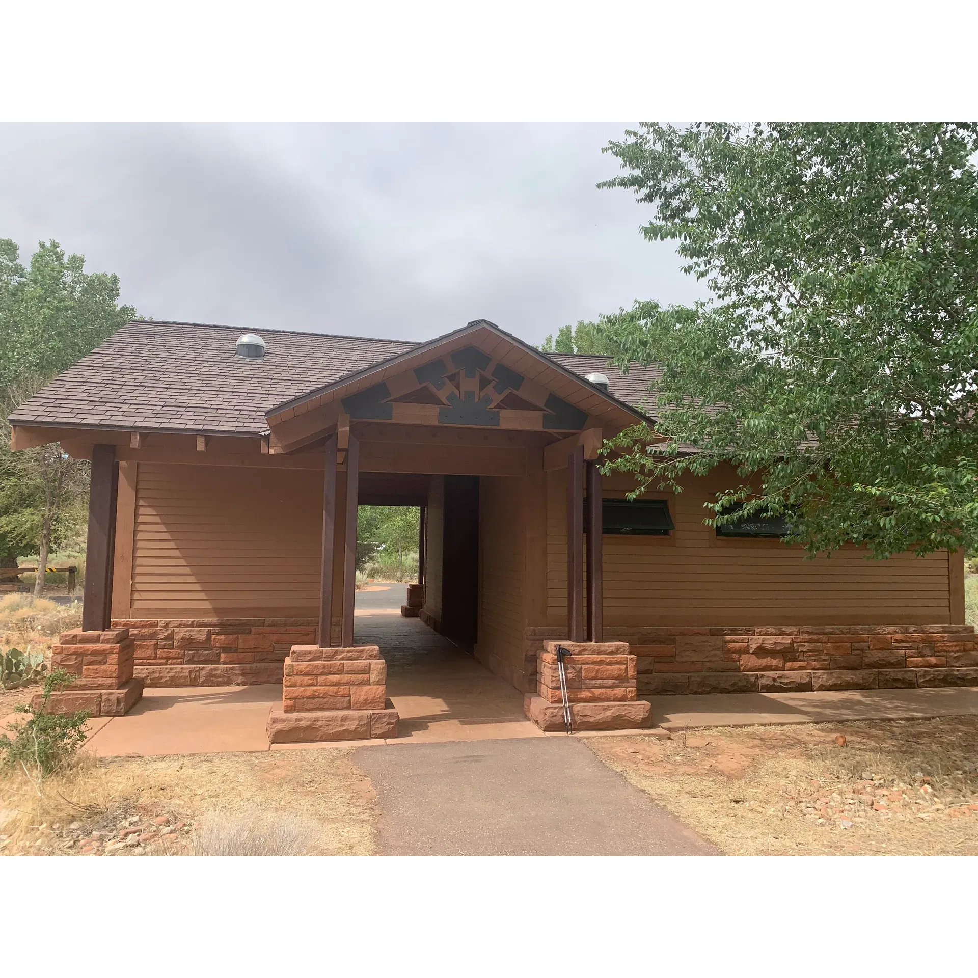 Watchman Campground stands as a premier outdoor accommodation, immersed in the unspoiled allure of Zion National Park. Offering an array of prime RV spots with convenient 30amp electric service, the grounds enable guests to revel in the harmony of nature, as the serene currents of the Virgin River flow gently mere feet away. The abundance of sites, including the highly praised B44, features ample space for both relaxation and nature-bound activities, further enriched by the commonplace sightings of local wildlife, such as graceful deer and impressive Bighorn Sheep.

Guests speak fondly of their early morning awakenings to the tranquil sights of wildlife in their natural habitat, often enhancing their experience with an invigorating hike along the nearby Watchman Trail—a scenic journey promising stunning vistas and memorable encounters with the park's fauna. The campground's strategic location ensures easy access to essential visitor amenities, including a welcoming visitor center just a short stroll away, offering a wealth of park information and a treasure trove of souvenirs.

The thoughtfully designed campsite integrates convenience with cleanliness, boasting well-maintained restrooms and strategically placed dumpsters that guarantee a pristine environment. While accommodating essentials like dumping stations for trash, the site planning guarantees these facilities remain inconspicuous to guests, enhancing the pleasant surroundings and the overall camping experience.

Watchman Campground caters to the explorative spirit with trailheads for several popular hikes available right within the campground's surroundings—an adventurer's dream, with trails suited to varying levels of hiking proficiency. Moreover, the proximity to Springdale and the accessibility of shuttle services expand the spectrum of adventure and leisure, from shopping excursions to dining experiences, all within walking distance of your peaceful retreat.

The campground is well-adapted for both reclusive tranquility and family activity, with capacious sites offering built-in fireplaces, perfect for those who savor the taste of a meal cooked over an open flame or wish to bask in the warmth of a crackling fire under the starlit canvass of a clear night sky. Fully prepared for the modern traveler, convenient amenities like picnic tables and outdoor faucets enhance the outdoor living experience, while electrical outlets provide that essential touch of modernity—suitable for both the nature enthusiast and the tech-savvy visitor.

Watchman Campground is a haven for those seeking to blend the raw beauty of Utah's wilderness with the comforts and conveniences of well-facilitated outdoor accommodation—all woven together to craft a sublime nature venture that beckons explorers back time and time again. Description by ChatGPT.