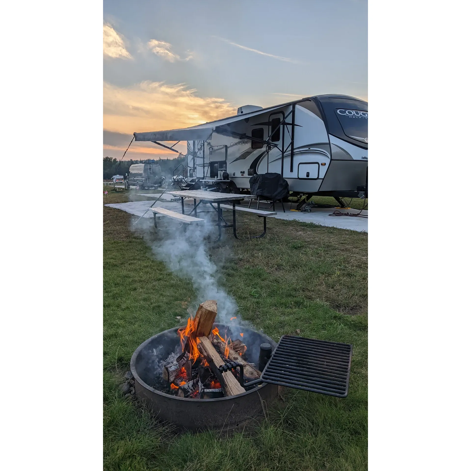 Pictured Rocks RV Park offers a modern and serene camping experience just a few miles outside the picturesque town of Munising, Michigan. With its proximity to the splendors of Pictured Rocks National Lakeshore, this relatively new RV park stands as an ideal base for explorers seeking outdoor adventures without sacrificing comfort.

The park's well-spaced and expansive sites provide ample room for relaxation and privacy, catering to both seasoned RVers and newcomers alike, with full hookups including 20-30-50 amp electricity. The sites are meticulously maintained, offering a mix of concrete pads and gravel lots to accommodate a variety of preferences, and are designed to facilitate easy navigation and parking, even for larger rigs stretching up to 73 feet.

Pictured Rocks RV Park ensures a stress-free stay with reliable amenities such as satisfactory internet connectivity, an effective laundry facility, and consistently clean restrooms and showers, equipped with hot water for a comforting end to a day of exploration. While the park's design may prioritize functionality over aesthetic complexity, the spacious, level sites afford a tranquil retreat after exciting day trips in the surrounding area.

Guests of the park can enjoy swift access to nearby public beach areas, the small-town charms of Munising, and a plethora of local dining options. Several visitors have commended the park's reasonable pricing and for maintaining high standards of cleanliness and upkeep.

The park's burgeoning landscape, part of its ongoing development, promises greener futures and the potential for enhanced recreation facilities. As Pictured Rocks RV Park continues to grow and address the feedback of its guests, it remains a preferred spot for many travelers eager to discover the majestic natural beauty of Michigan's Upper Peninsula. Description by ChatGPT.