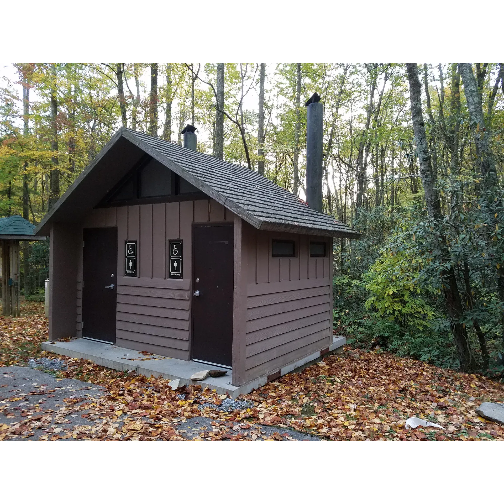 Round Mountain Campground offers guests a serene and peaceful retreat in a pristine natural setting. Here, the spacious campsites offer plenty of room for relaxation and intimate engagement with the wilderness. The campground's appeal lies in its simplicity and emphasis on self-sufficiency, where campers are encouraged to embrace the 'pack-in, pack-out' ethos, fostering a clean and unspoiled environment for all to enjoy.

With well-maintained vault toilets and an emphasis on cleanliness, the emphasis on sustainability and respect for nature is evident throughout the campground. Campers can appreciate the tranquility that comes with no cell service, allowing for an undisturbed connection with the outdoors and cherished companions.

Round Mountain Campground is conveniently located only a short 10-minute drive from the stunning landscapes of Max Patch and a brief 5-minute journey to Lemon Gap. For those seeking a refreshing escape, the high elevation provides a cool haven away from summer heat. Campers with a penchant for rustic experiences will be satisfied with the backcountry car camping sites, which are complemented by the running streams suitable for water filtration.

The quiet and cool ambiance of Round Mountain Campground is a magnet for those looking to unwind and immerse themselves in nature. Outdoor enthusiasts will find it an inviting place to pitch their tents, with no need for electrical or water hookups, ensuring an undisturbed and authentic camping experience. It's truly an ideal destination for anyone looking to take a break from the daily grind and bask in the wilderness's simple joys. Description by ChatGPT.