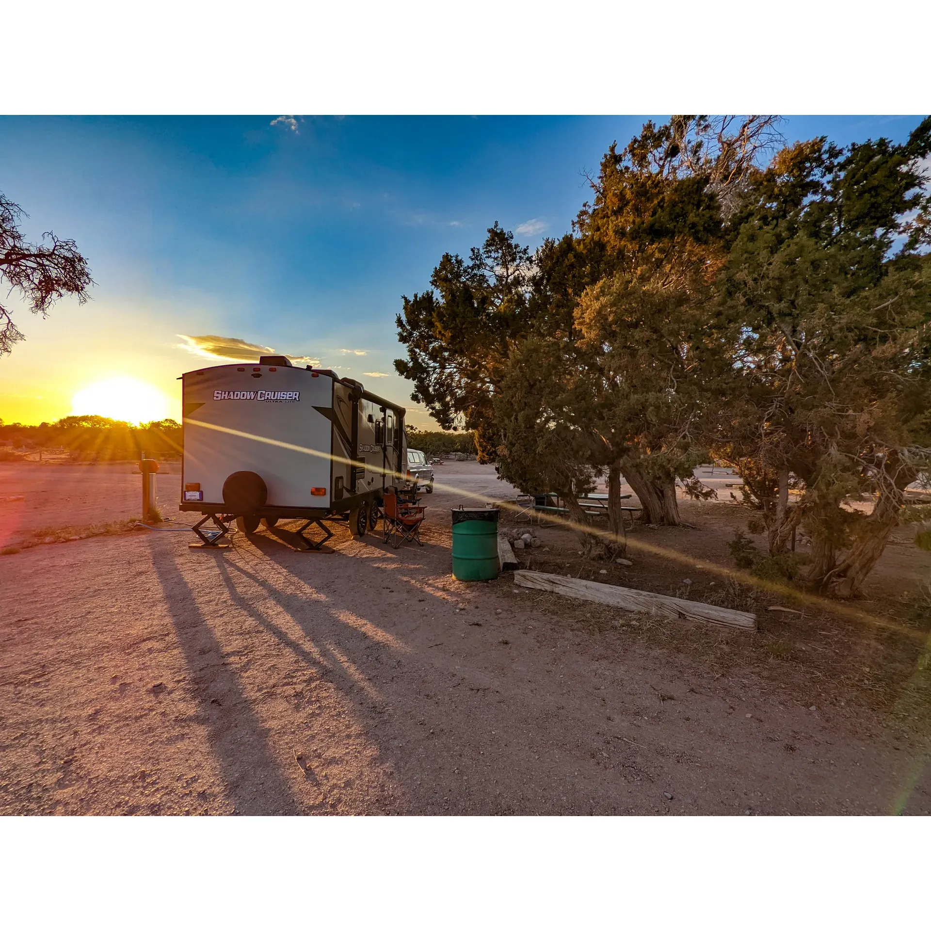 Grand Canyon Caverns Campground offers a truly authentic outdoor experience surrounded by the tranquil beauty of juniper trees and the serenity of a quiet desert setting. The campground provides a unique combination of nature and convenience, being situated just a mile off the highway to ensure peace and isolation from the hustle and bustle. With its picturesque sunsets and sunrises, guests are treated to some of the most breathtaking views of the Arizona landscape.

The expansive site gives visitors the freedom to choose their perfect spot upon check-in at the Cavern Inn. Adventure seekers find the location ideal as it lies only 12 miles from the Hualapai Game and Fish Department, from where they can venture off on Diamond Creek Road all the way to the inviting Colorado River, making it a perfect base for exploration.

For those interested in RV camping, the grounds feature spaces with 30/50A electrical hookups and water, complemented by clean sites and a friendly staff ready to assist guests. Although there are no sewer hookups, there is an accessible dump station for convenience. Guests can unwind at a clean pool exclusive to RV goers, creating a refreshing oasis in the desert setting.

The spirit of generosity and hospitality is strongly felt at Grand Canyon Caverns Campground, which is evident from the stories of campers receiving exceptional kindness from the campground owners. Comfort facilities such as individual shower rooms provide a warm and clean space to freshen up, while the availability of a laundry room with complementary machines adds to the convenience of a stay here.

Guests also enjoy added perks such as a free continental breakfast at the nearby cafe, ensuring that they start their day with a delightful meal. For alternative dining options, the campground is a short walk from a restaurant offering warm meals after a day of adventure, and those looking for a unique experience can dine at the Grotto in the caves during select hours on weekends.

Adding to the charm of the location, the Grand Canyon Caverns Campground is a place where guests can enjoy starry nights free from light pollution, immerse themselves in the sounds of wildlife such as owls and crows, and partake in interesting tours of the nearby grotto, complete with entertaining guides.

This campground is an ideal retreat for those seeking a genuine connection with the outdoors, offering a mix of tranquility, adventure, and heartfelt hospitality deep in the heart of the desert. Description by ChatGPT.