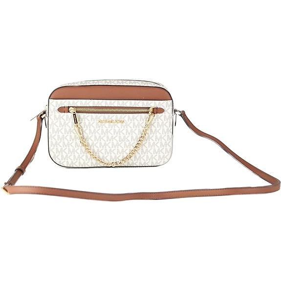 The Michael Kors East West Chain is a stylish and versatile handbag that features a classic brown color. This bag is perfect for everyday use, as it can easily be paired with a variety of outfits and styles. The chain detailing adds a touch of sophistication and elegance to the overall design of the bag.