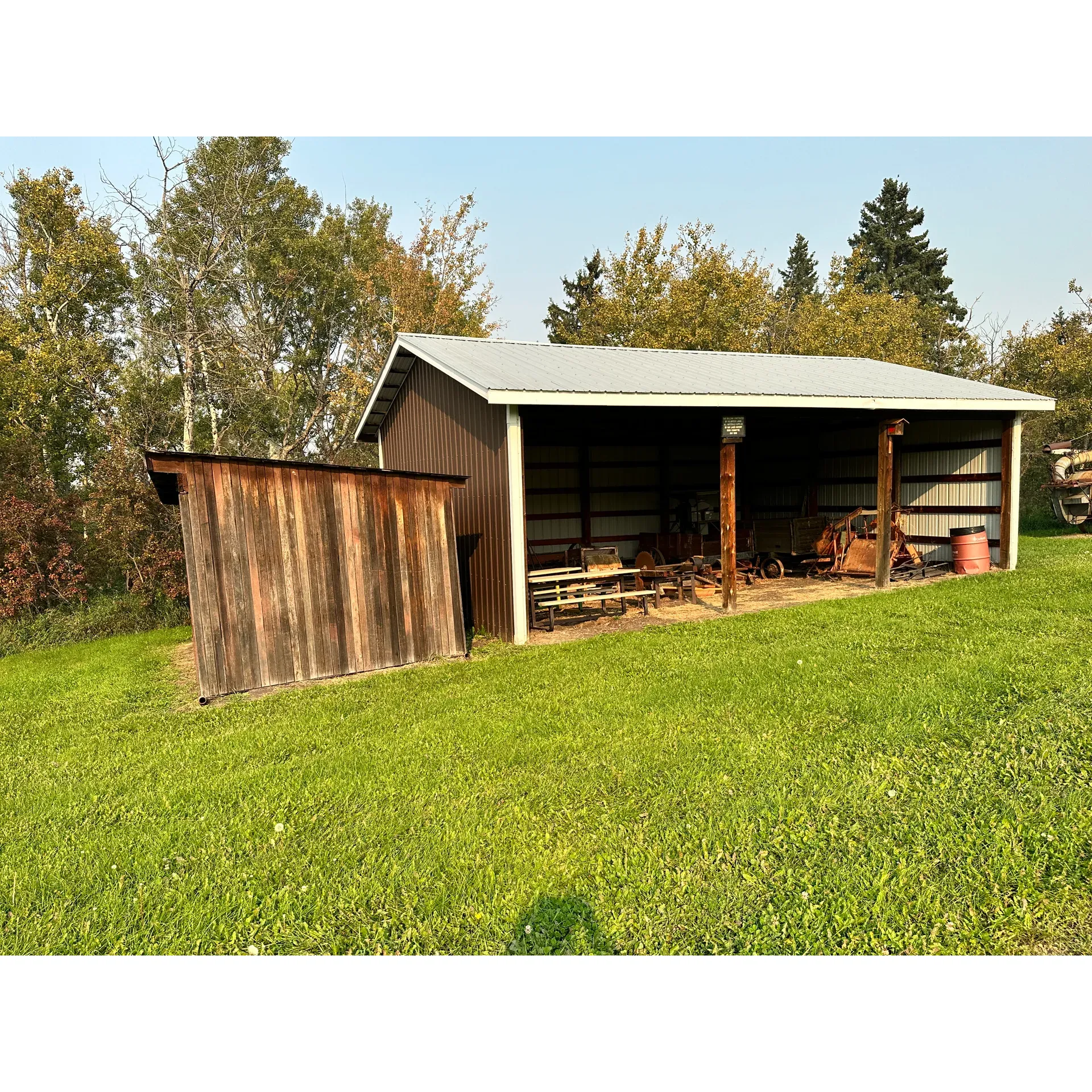 Village of Hay Lakes Telegraph Park offers an idyllic setting for campers looking for a tranquil getaway with modern conveniences and natural charm. The campground features spacious, powered sites that allow for both comfort and privacy, each surrounded by well-maintained and groomed green spaces that highlight the beauty of the great outdoors.

A standout amenity is the enclosed kitchen building, equipped with a large wood stove that boasts ample cooking surface, offering a rustic and cozy environment for meal preparation and social gatherings. Anglers will appreciate the trout-stocked fishing area, providing a serene spot for casting a line and enjoying the simple pleasure of freshwater fishing.

While it is a peaceful enclave for camping, Village of Hay Lakes Telegraph Park doesn't only cater to those with a love for night skies and tent pegs; it's also an inviting locale for day visits and nature enthusiasts. The park provides charming walking trails for those who like to explore the local flora and fauna, while group camping areas are available for larger gatherings or family reunions, making it a versatile choice for various outdoor activities.

Visitors can enjoy the sights and sounds of the wilderness and relish in the camaraderie that comes with campsite living. With the promise of a lovely atmosphere and plenty of outdoor enjoyment, Village of Hay Lakes Telegraph Park is a delightful destination for those seeking a leisurely camping experience and a break from the rush of daily life. Description by ChatGPT.