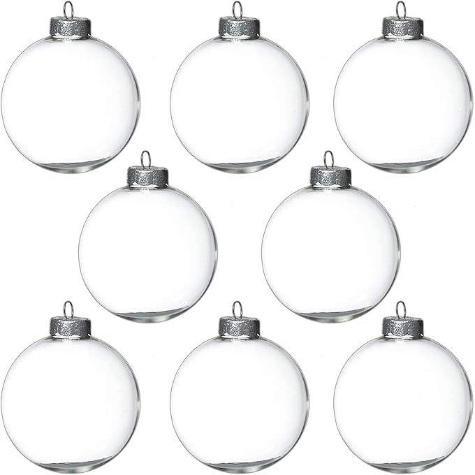 The 4E's Novelty 12 Pack 3.15 Inch Clear Glass Christmas Ornament Balls are perfect for craft projects and decorating your Christmas tree. Each pack comes with 12 large 80mm clear glass ornament balls that are fillable, allowing you to customize them with your own decorations or trinkets.