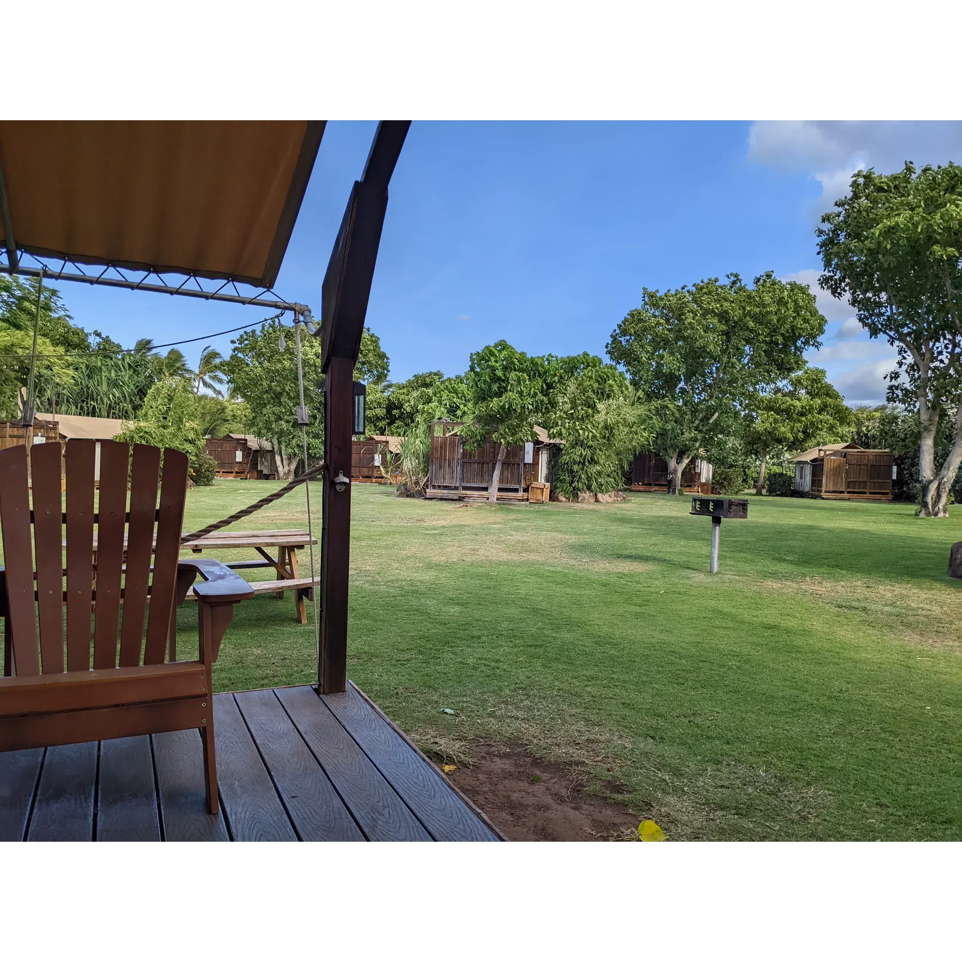 Experience the essence of outdoor tranquility at Camp Olowalu, an inviting campground set amidst a stunning landscape that captures the heart of nature enthusiasts. This picturesque campsite offers guests the unique opportunity to slumber under the stars by the soothing oceanfront, serenaded by the gentle sounds of waves. The property provides a selection of clean and comfortable tent sites, each accompanied by a picnic table, conveniently positioned to encourage social interactions while maintaining a sense of privacy.

Delight in the sensory pleasures of early morning, as the aroma of flowers at sunrise engulfs the area, offering an exquisite setting for meditation or simply basking in the beauty of the dawn. Complemented by the provision of morning coffee, Camp Olowalu ensures that each day starts with a warm and refreshing touch.

Strategically located near Lahaina, the campground allows for easy access to a variety of local attractions, including mountain vistas and the allure of rainbows on the horizon. A stone's throw from the ocean, guests can indulge in excellent snorkeling opportunities among friendly sea turtles and a wealth of marine life.

Camp Olowalu boasts well-maintained washroom facilities, appreciated for their cleanliness and unique outdoor showers, adding a touch of nature to your daily routines. The environment-friendly practices, such as the need to bring your own soap for dishwashing, reflect the camp's commitment to sustainability.

The camp is a haven for families and solo adventurers alike, with glamping options available for those seeking less traditional camping experiences. With conveniences like WiFi and on-site ice purchases, the campground caters to the needs of the modern traveler while preserving the charm of an escape from the bustle of daily life. 

Whether you're looking to immerse yourself in recreational activities such as kayaking and snorkeling in the calm waters or just seeking a restful spot to connect with nature, Camp Olowalu invites you to a serene getaway complete with friendly wildlife such as the local roosters and chickens. With its fair pricing and range of amenities, guests leave this special place with fond memories and a yearning to return. Description by ChatGPT.