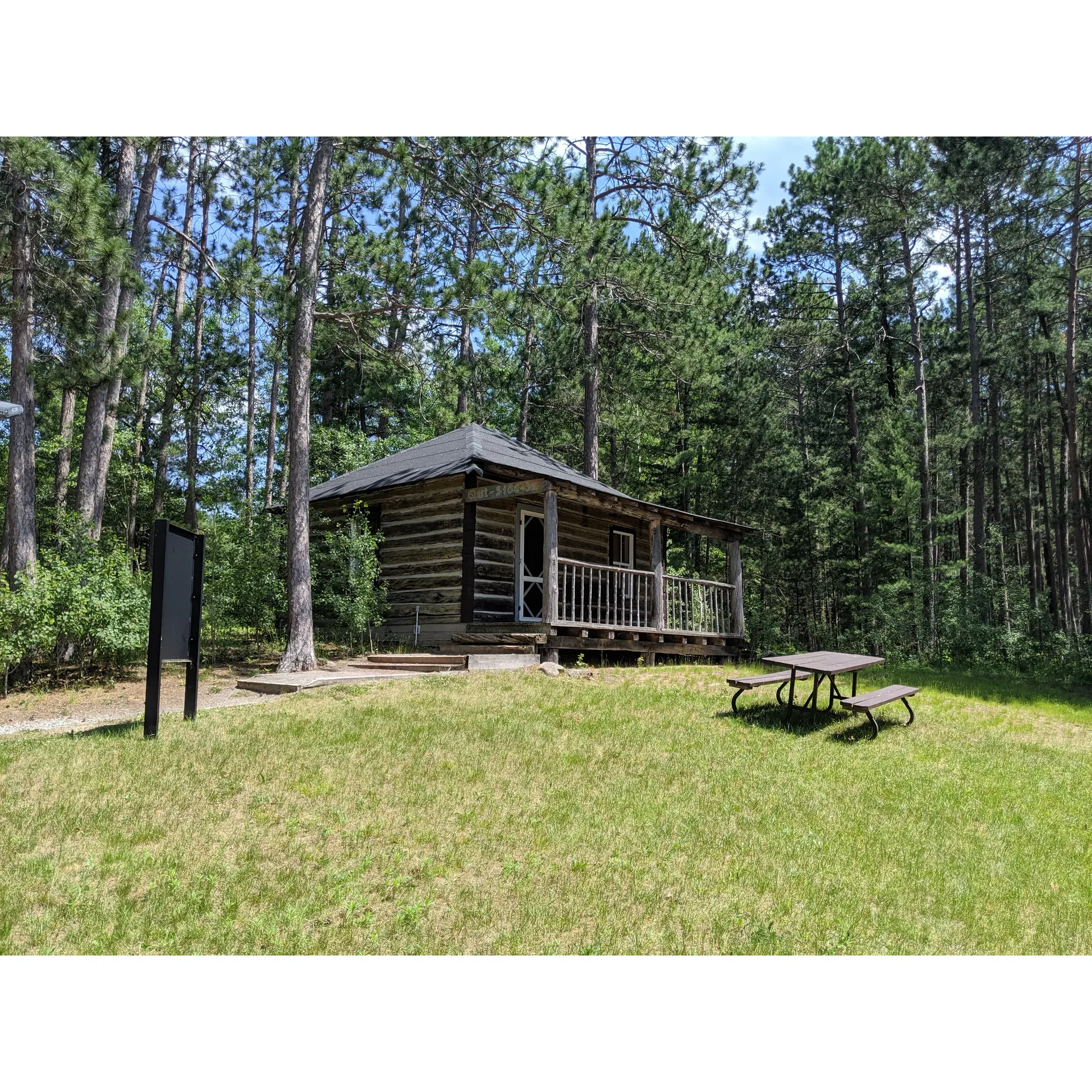 Achray Campground Office serves as the launching point for a variety of serene outdoor experiences surrounded by the natural beauty of a pristine environment. The highlight for many visitors is the availability of a well-equipped yurt, perched on a charming deck and featuring amenities such as bunk beds that cater to family and friends, comfortable lawn chairs, and a bright LED light for evening illumination. The yurt, which presents a unique glamping opportunity, is complemented by a BBQ for outdoor cooking enthusiasts, complete with propane and an additional burner, as well as a conveniently located picnic bench for group meals and socializing.

For those with an adventurous spirit, the campground also offers kayak and canoeing opportunities to explore the natural grandeur of the area. The surrounding waters accommodate paddlers with a rich tapestry of wildlife, including loons and clams, and scenic sandy beaches that invite relaxation. The journey to the camping spots is an adventure in its own right, tracing the path of old railway tracks and leading to tranquil sites along the water's edge.

Regular visitors hail Achray Campground as a treasured haven, with a legacy spanning over three decades, noted for its canoeing paradises and two accessible hiking trails. The notable absence of cell service underscores the campground's appeal as an escape, providing guests the chance to unplug and immerse in the serenity of nature. The presence of clean restrooms and additional latrine toilets caters to the comfort of guests, while friendly wildlife like chipmunks adds a whimsical touch to the environment. For leisure moments, picnic tables set against a backdrop of an amazing lake view make for memorable gatherings, and facilities such as a camping office equipped with treats like ice cream in the summer months round out the experience of a truly delightful and rejuvenating stay at Achray Campground. Description by ChatGPT.