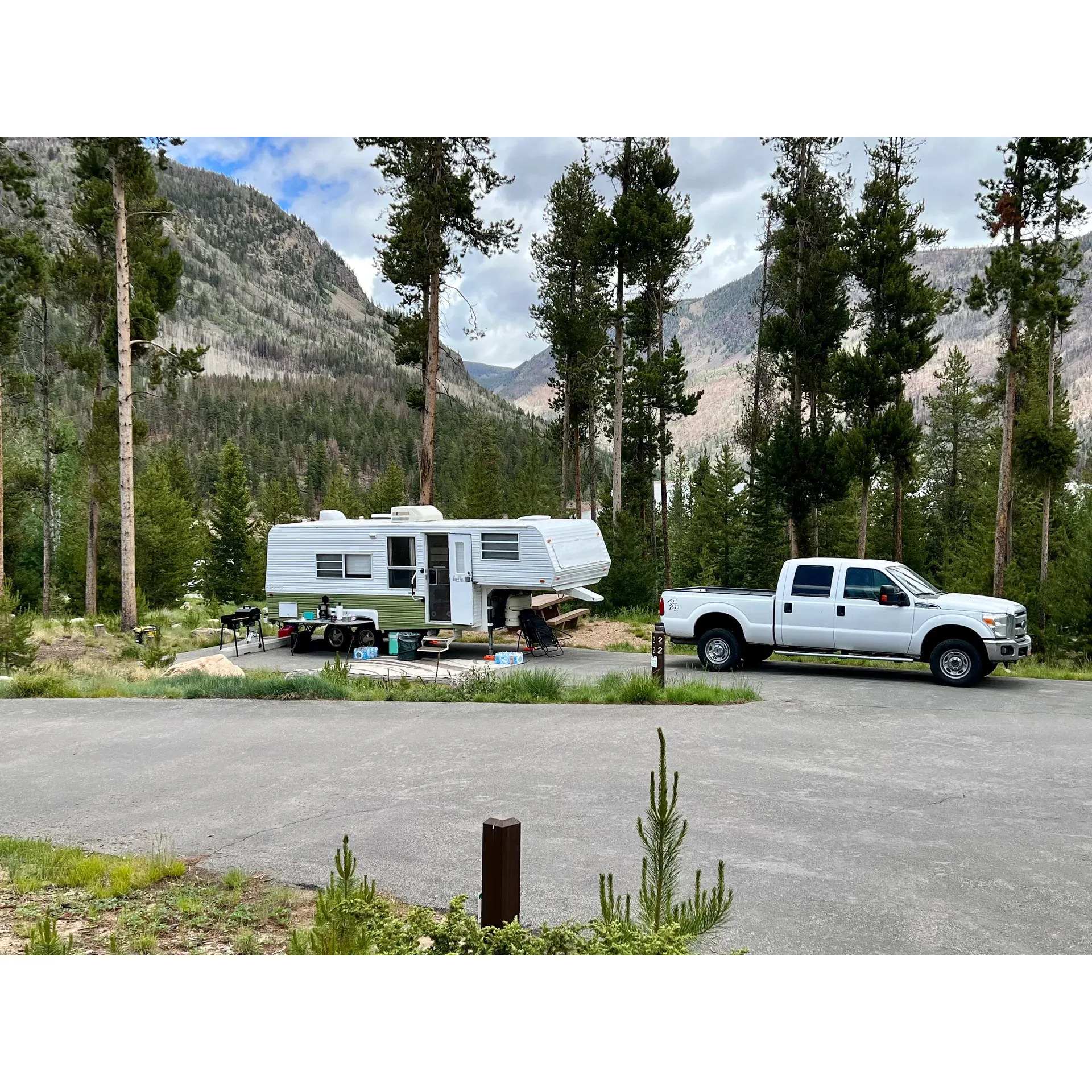 Moon Lake Group Campground invites guests to a serene outdoor haven offering an exclusive retreat for group gatherings amidst the natural splendor of a picturesque lakeside setting. Visitors cherish the panoramic vista that greets them upon arrival, often noting the scenic drive is a rewarding prelude to their stay. Anglers find solace in the calm waters, with fishing opportunities that keep them returning to the shimmering lake, patiently awaiting the tug of the line from the shore or aboard inflatable and fishing boats.

The well-maintained facilities enhance the rustic charm of the campground. Each campsite is equipped with sturdy concrete tables and thoughtfully designed fire rings, raised to ensure safety and comfort during those cherished evenings by the fire. Even with the occasional rain, the climate is largely pleasant, and the respite of clear evenings allows for cozy gatherings and storytelling illuminated by crackling flames.

Adventure beckons along the peaceful trails that meander through the area, featuring an accessible bridge crossing the lake's inlet, a delight for both children and adults alike. The trails invite nature lovers to explore, with the recommendation of sturdy boots to navigate muddy patches, adding to the authentic outdoor experience.

With a nod to privacy and ample space, the group sites at Moon Lake are notably secluded, providing a sense of having a personal campground oasis. The sizeable loops can accommodate several RVs, including space for tents, making it an ideal locale for large gatherings. Each group site is complete with an abundance of tables and a large fire pit, catering to the needs of sizable parties without compromising on comfort or convenience.

Practical facilities include daily-cleaned pit toilets and water access points at each group site. While guests should prepare for a rustic experience devoid of electricity and dumping stations, these minor details pale in comparison to the abundant natural beauty and sense of escape that Moon Lake Group Campground affords.

Loyal visitors fondly recall memories created at this campground, from childhood to family reunions. With its proximity to the lake and accessible shoreline, it offers both tranquility and recreational fun. Boat rentals provide additional leisure pursuits, while the west-side hiking trail promises breathtaking views and intimate encounters with the local flora and fauna. Moon Lake GroupGroup Campground stands as a precious jewel, offering a respite from the hustle and bustile of city life and a place to forge lasting bonds with nature and loved ones. Description by ChatGPT.