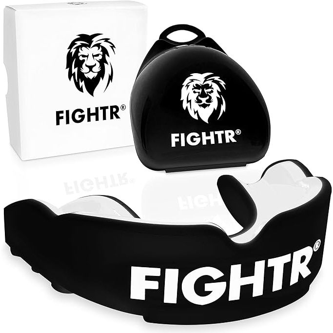 FIIGHTR offers the ultimate protection with their high-quality gum shield, designed to keep athletes safe while training or competing in sports like boxing, MMA, football, rugby, and muay thai. Constructed with a two-layer system, this mouth guard is not only mouth-friendly and easy to mold, but also provides top-notch protection against impacts.