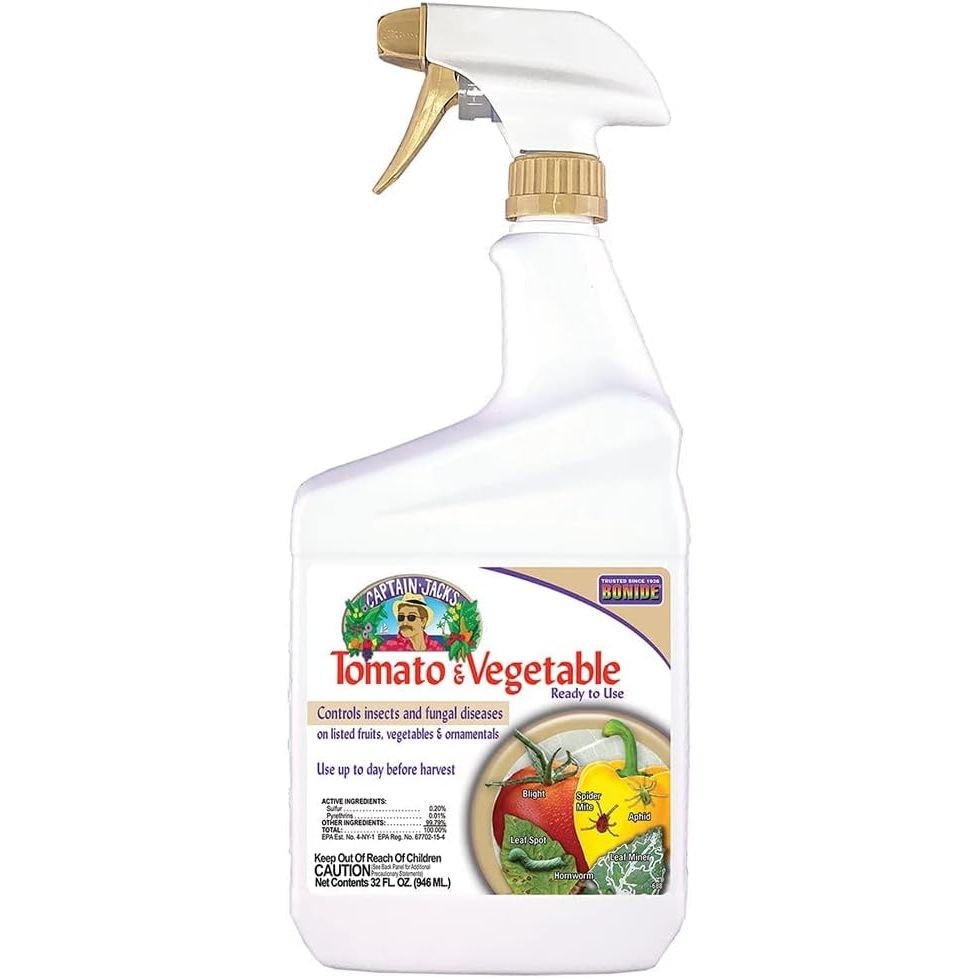 Bonide Captain Jack's Tomato & Vegetable Spray is a 32 oz ready-to-use spray designed for organic gardening. This product is formulated to protect tomato and vegetable plants from various insects and diseases, including caterpillars, leafminers, thrips, spider mites, and blight.